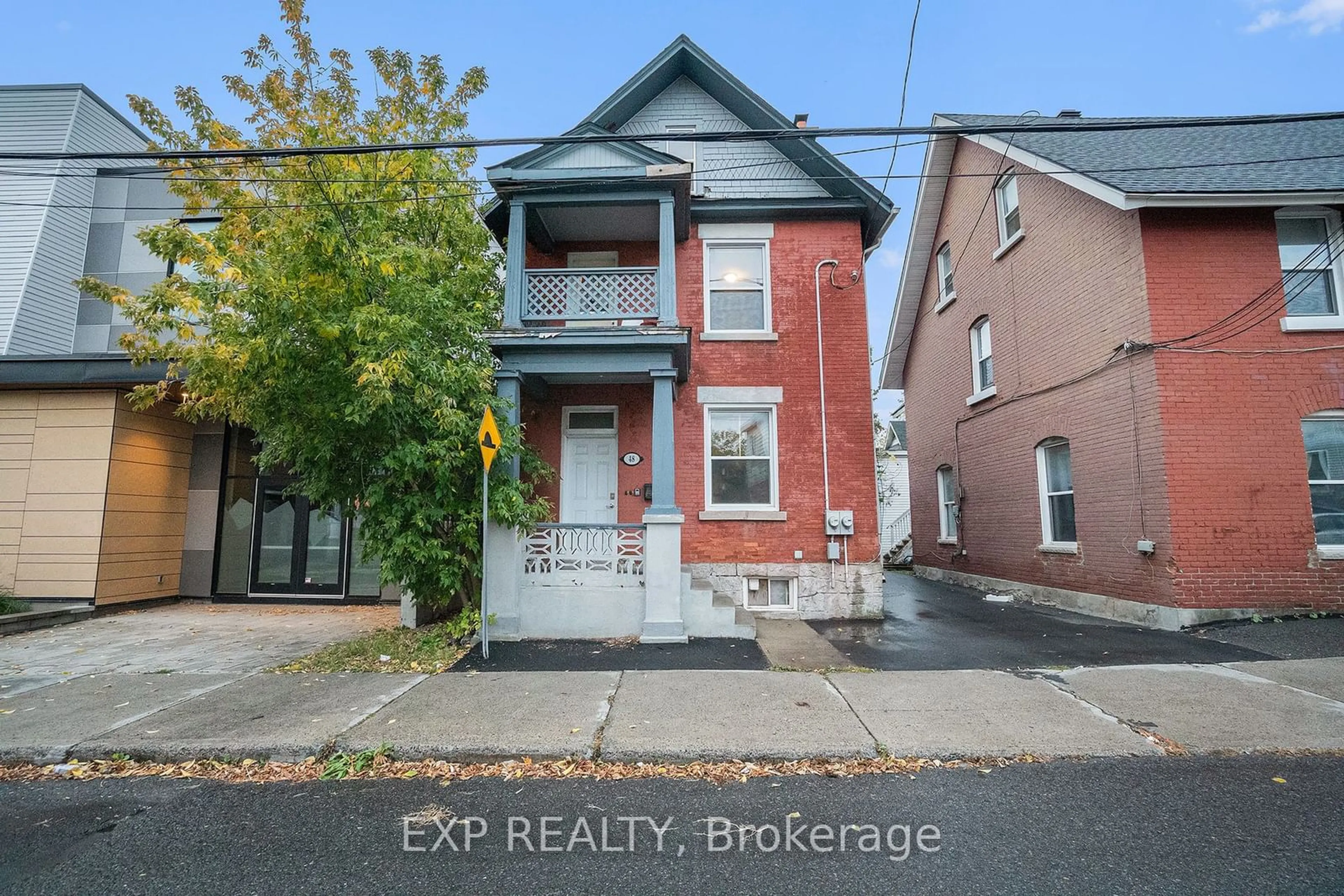 Frontside or backside of a home, the street view for 48 BELL St, West Centre Town Ontario K1R 7C7