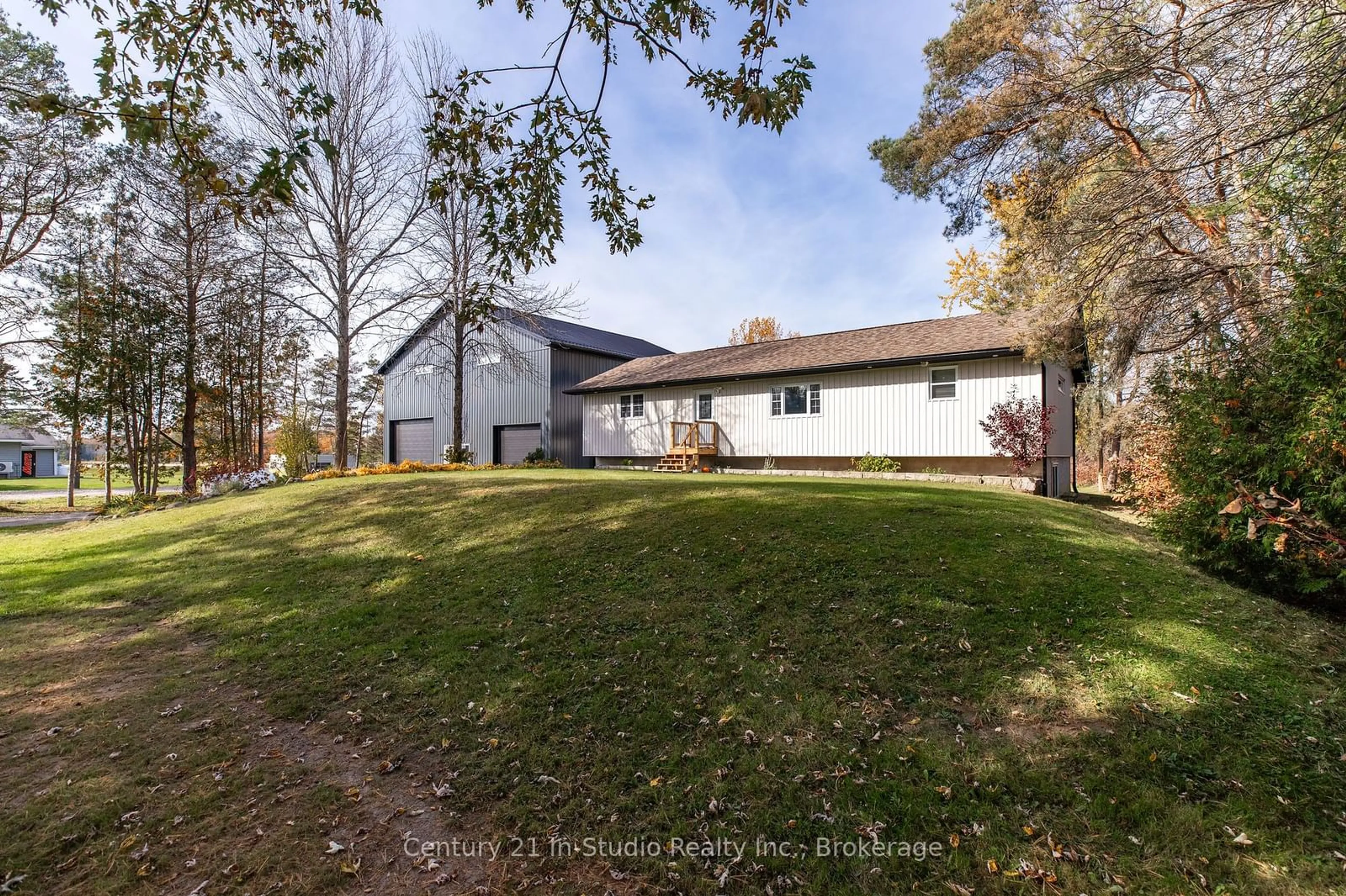 Frontside or backside of a home, the fenced backyard for 9 Maple Dr, Northern Bruce Peninsula Ontario N0H 1Z0