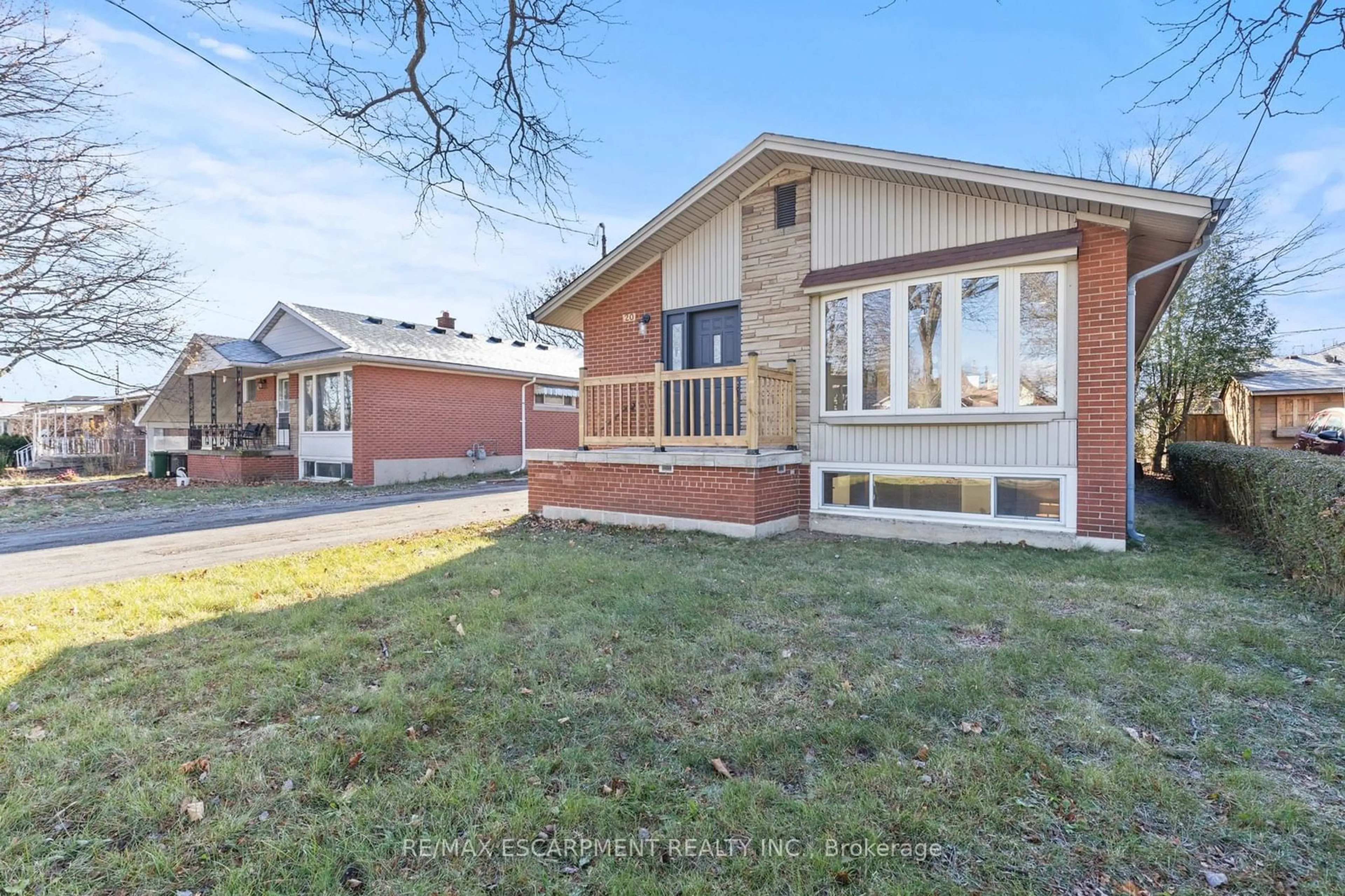 Frontside or backside of a home, the street view for 20 Burfield Ave, Hamilton Ontario L8T 2J9