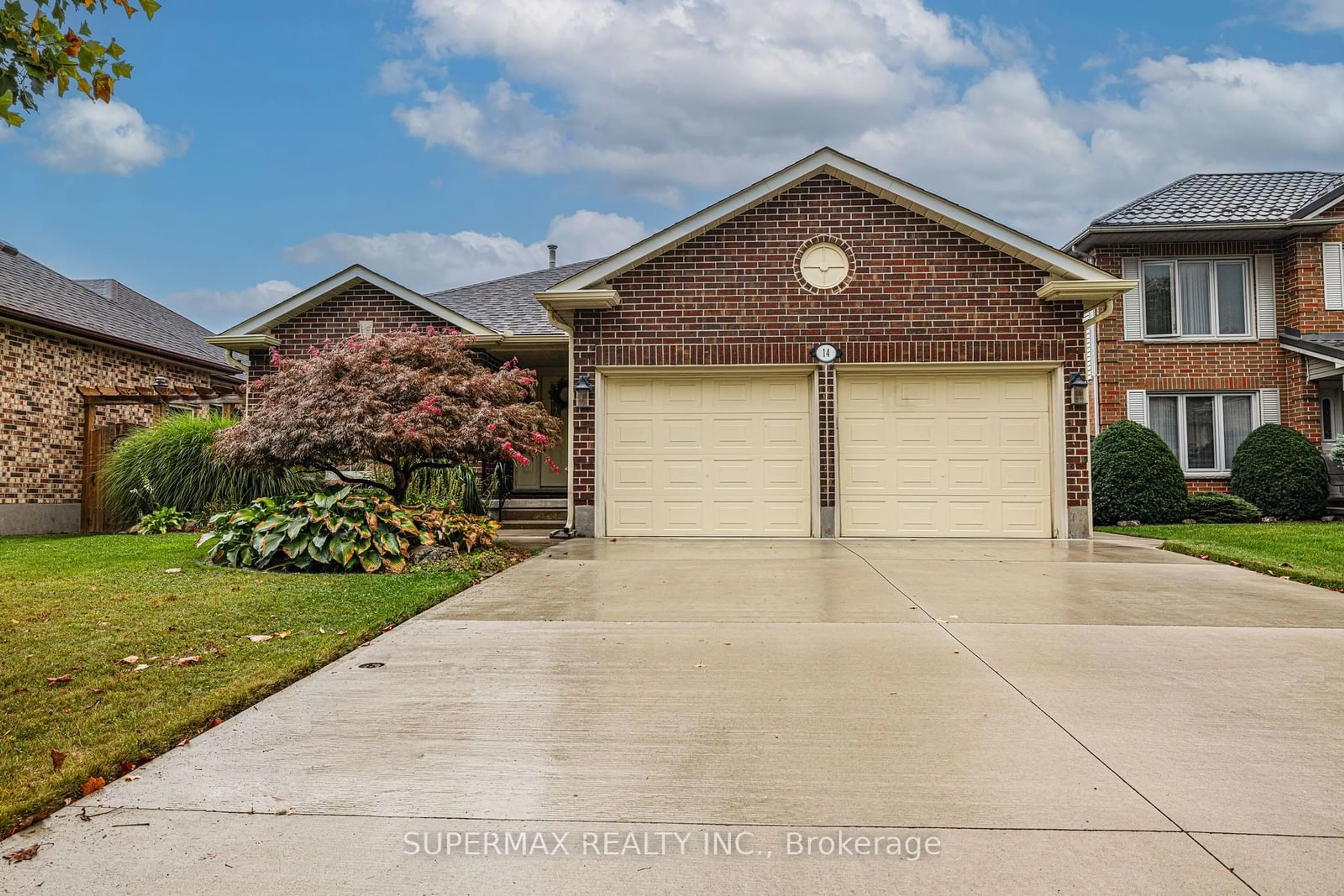 Frontside or backside of a home, the street view for 14 Martinet Ave, London Ontario N5V 4B6