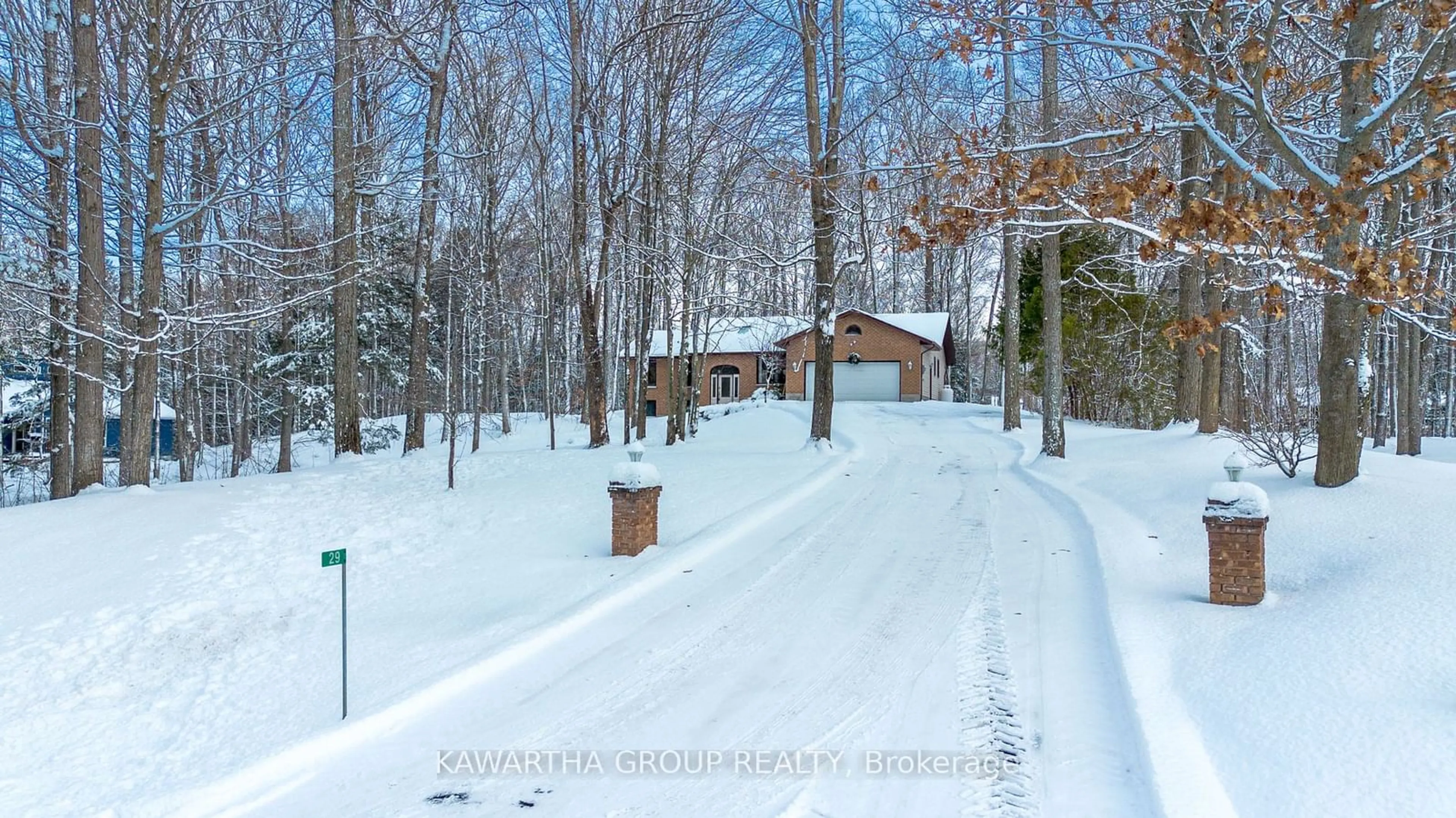 A pic from exterior of the house or condo, the fenced backyard for 29 Golf Club Cres, Kawartha Lakes Ontario K0M 1N0