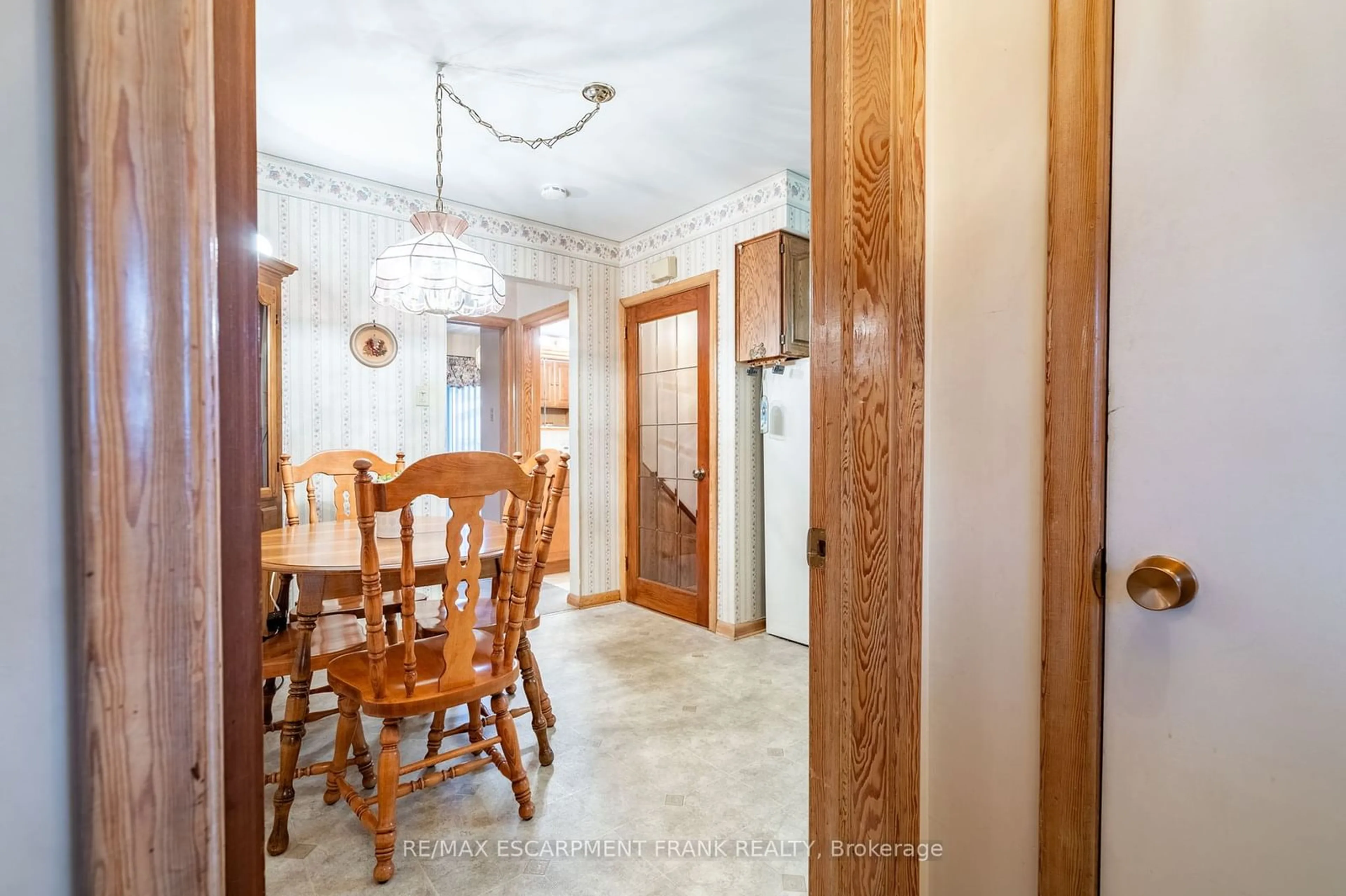 Dining room, wood floors, cottage for 1053 Fennell Ave, Hamilton Ontario L8T 1R7