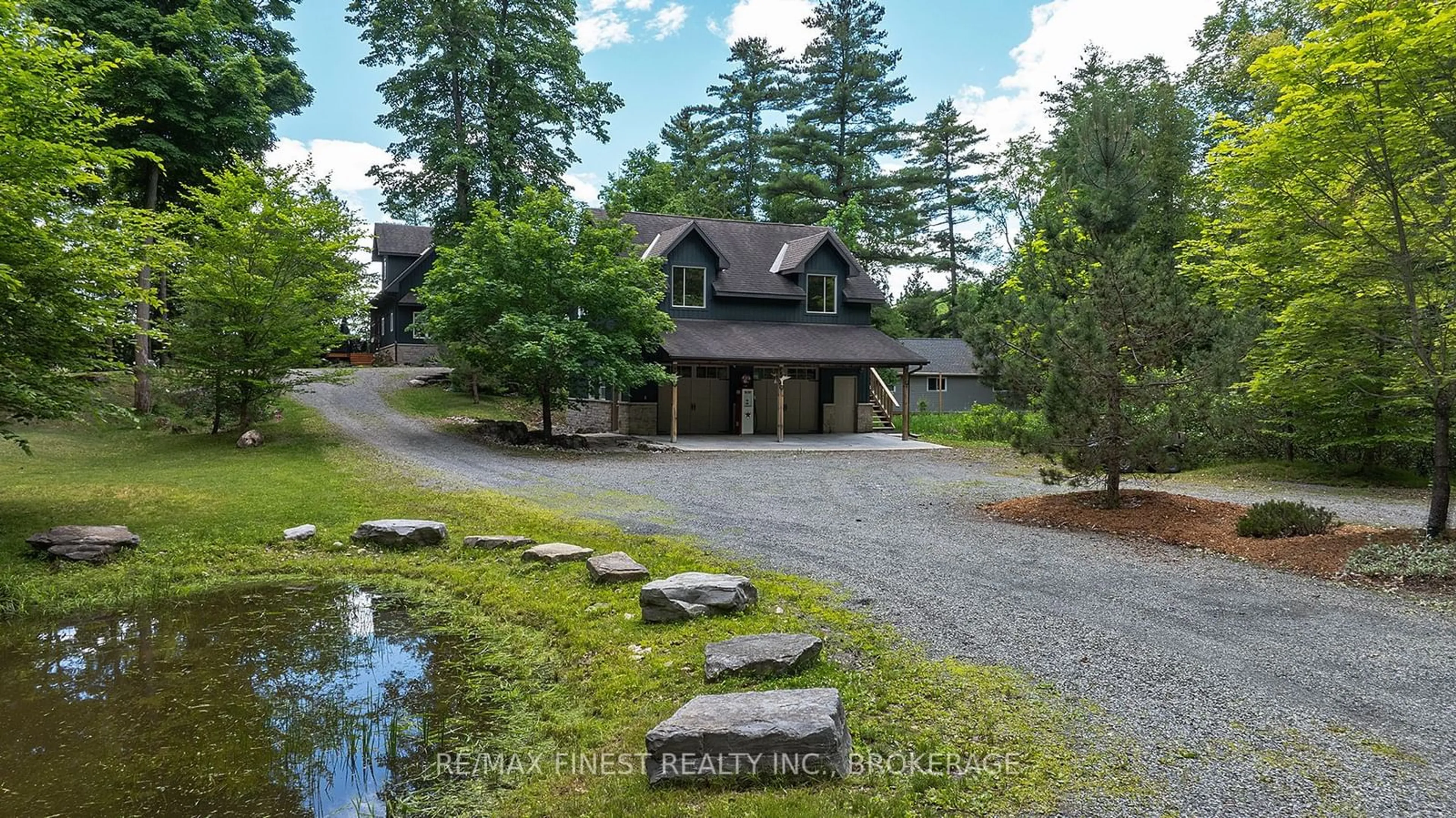 A pic from outside/outdoor area/front of a property/back of a property/a pic from drone, water/lake/river/ocean view for 441B MACCOMISH Lane, South Frontenac Ontario K0H 2L0