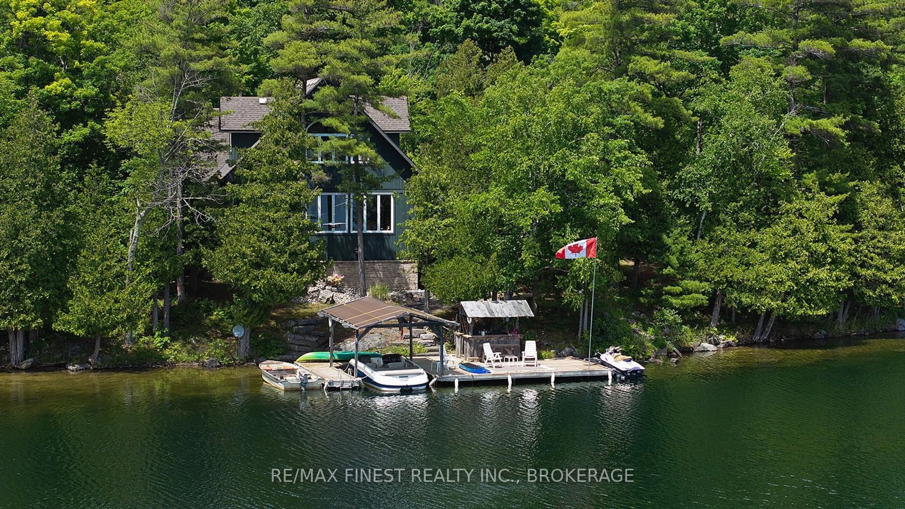 A pic from outside/outdoor area/front of a property/back of a property/a pic from drone, water/lake/river/ocean view for 441B MACCOMISH Lane, South Frontenac Ontario K0H 2L0