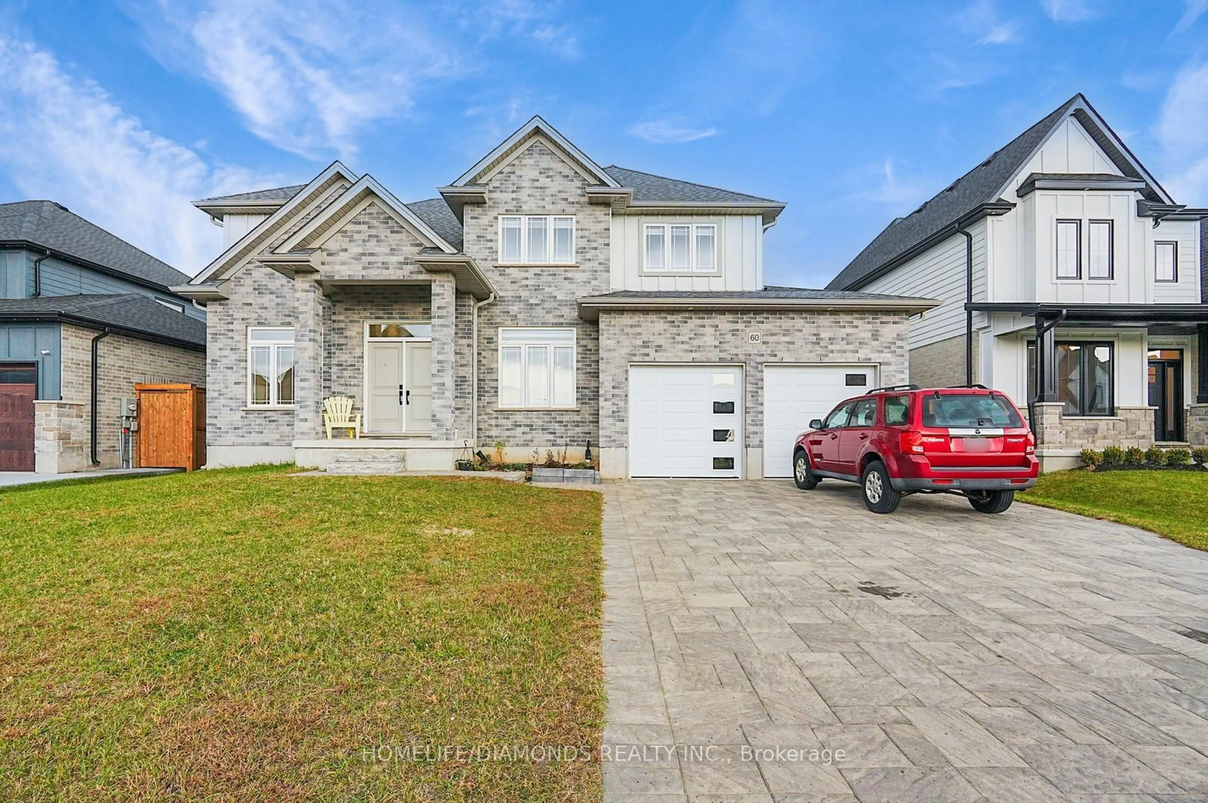 Frontside or backside of a home, the street view for 60 Hazelwood Pass, Thames Centre Ontario N0L 1G2