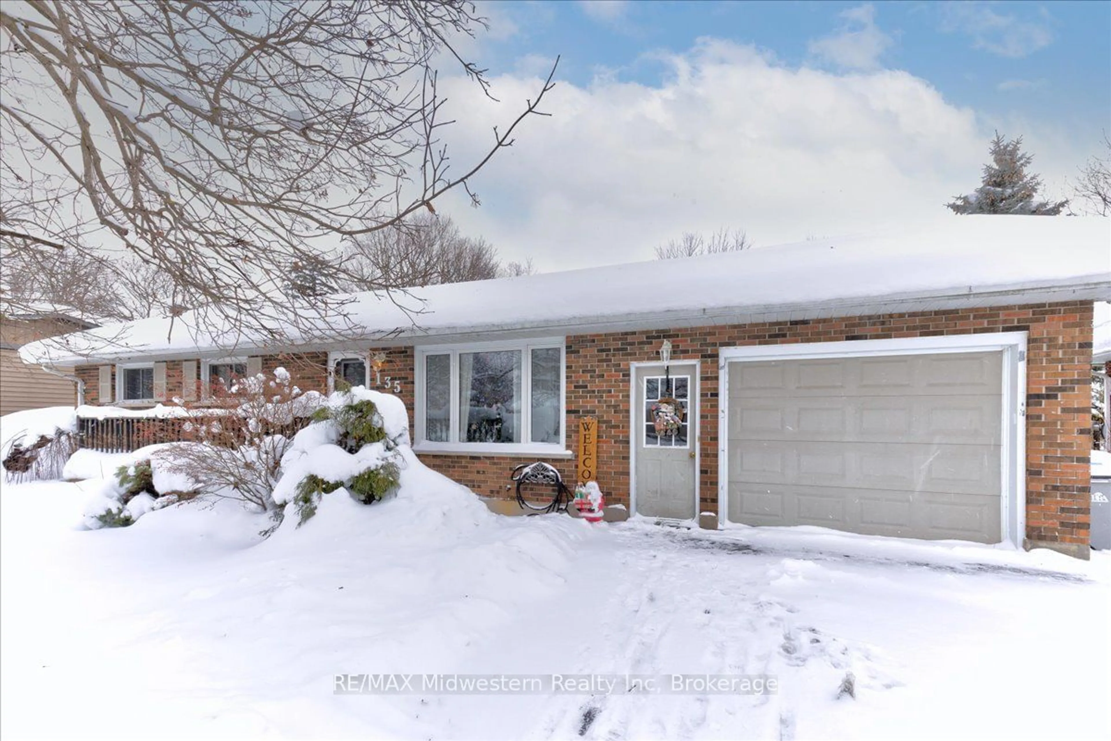 Frontside or backside of a home, the street view for 135 Queen St, North Perth Ontario N0G 1B0