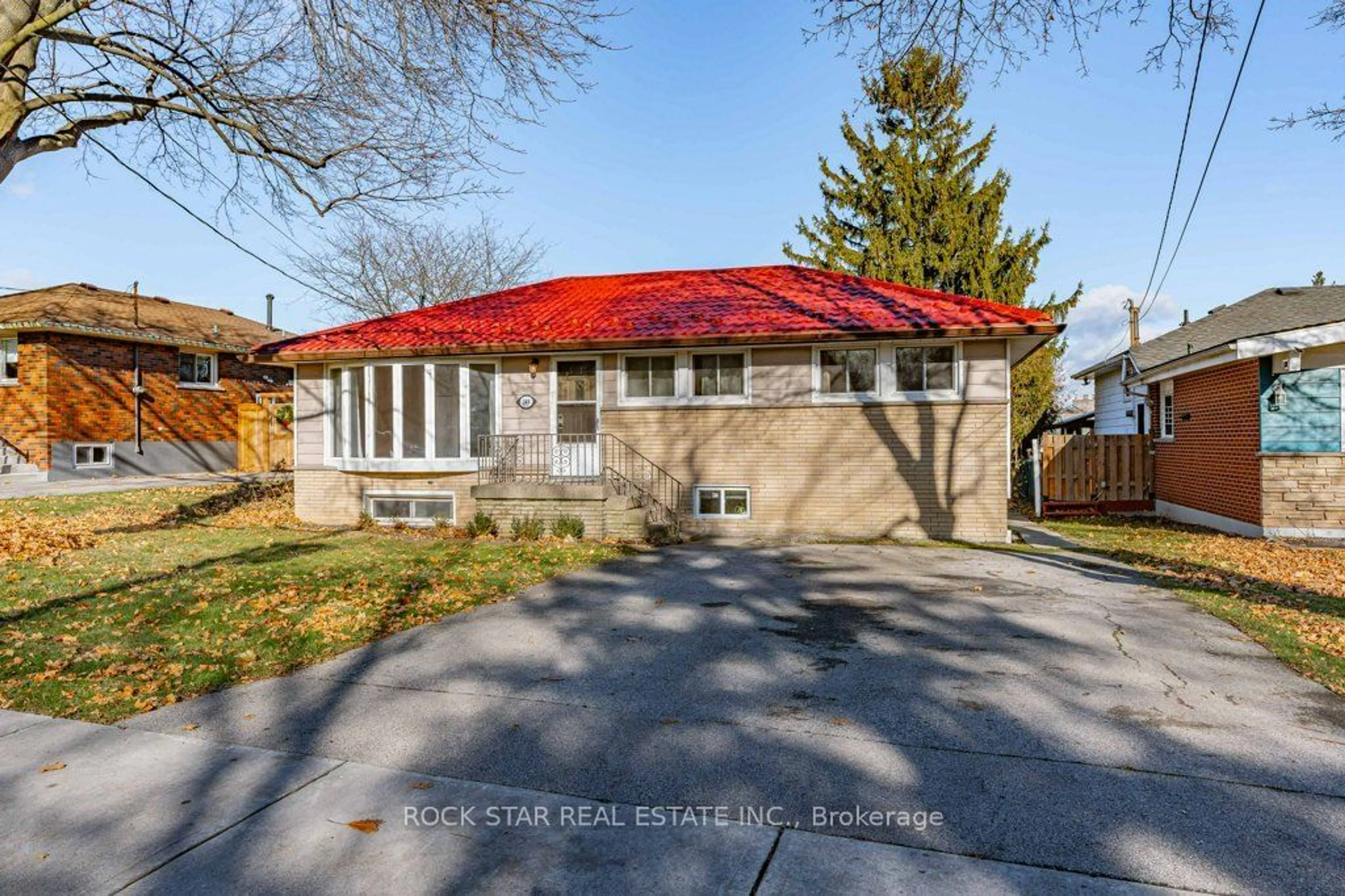 A pic from exterior of the house or condo, the fenced backyard for 149 Victor Blvd, Hamilton Ontario L9A 2V3