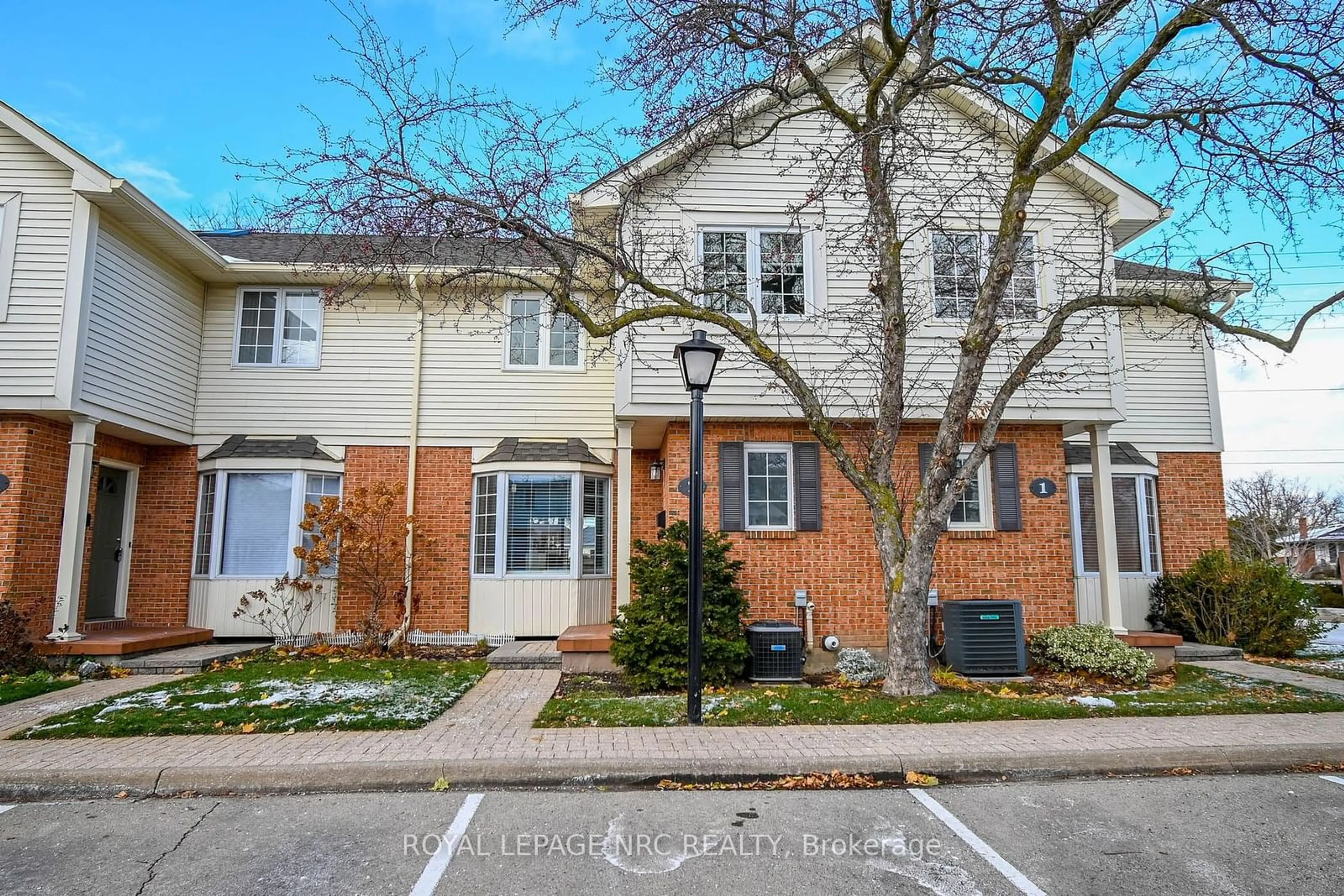 A pic from exterior of the house or condo, the street view for 275 Pelham Rd #2, St. Catharines Ontario L2S 3B9