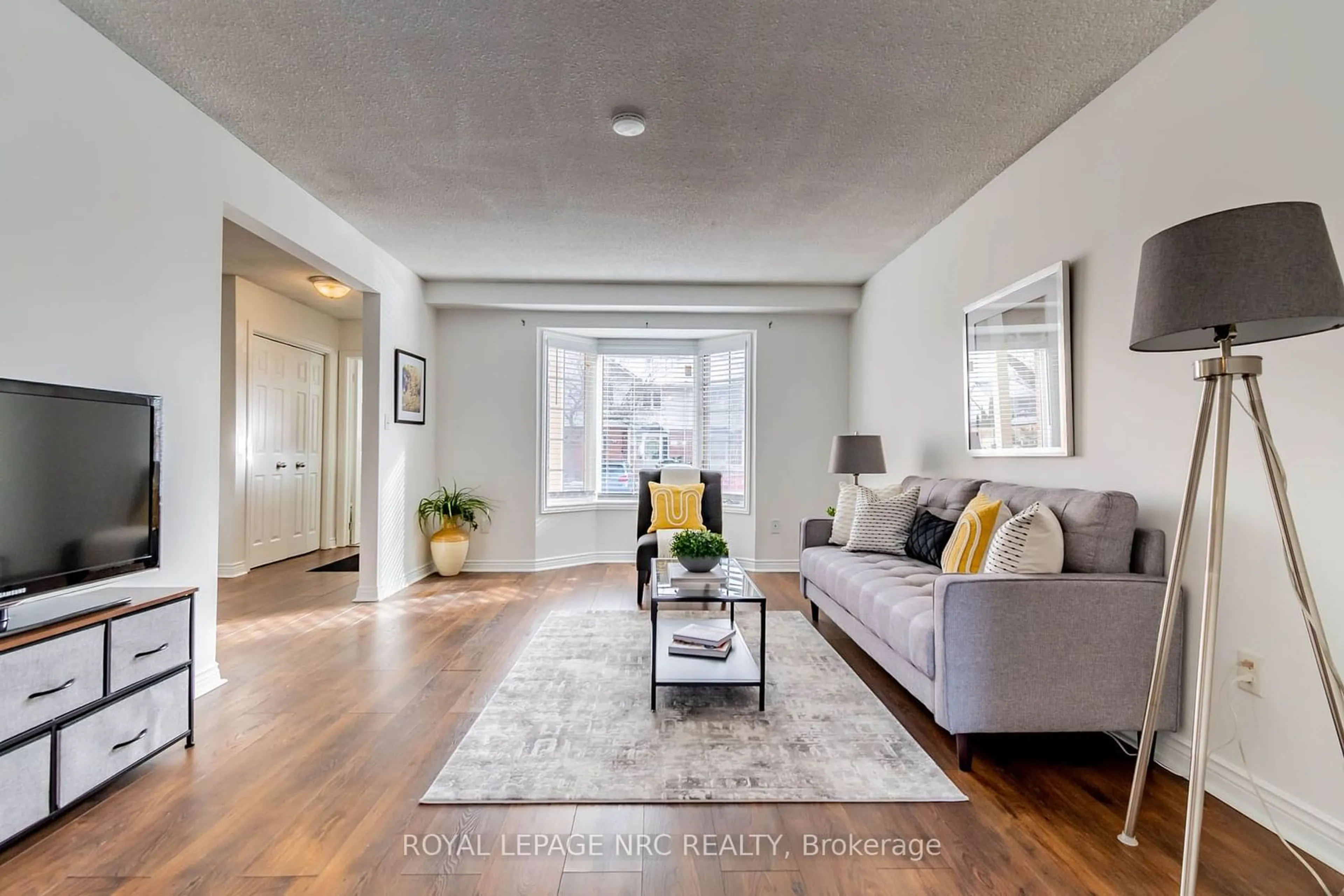 Living room, wood floors for 275 Pelham Rd #2, St. Catharines Ontario L2S 3B9