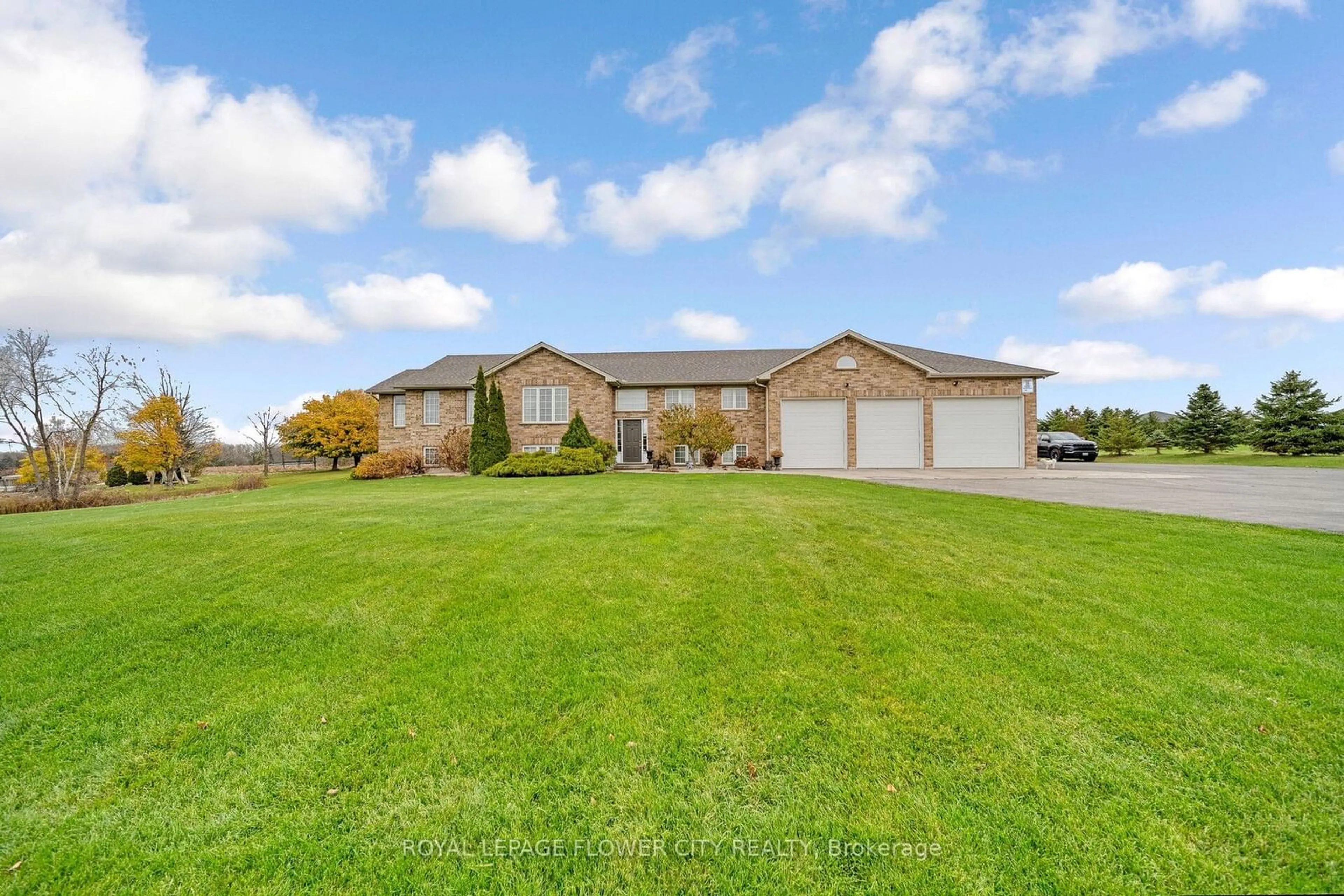 Frontside or backside of a home, the fenced backyard for 14 Stardust Dr, Thames Centre Ontario N0L 1G5