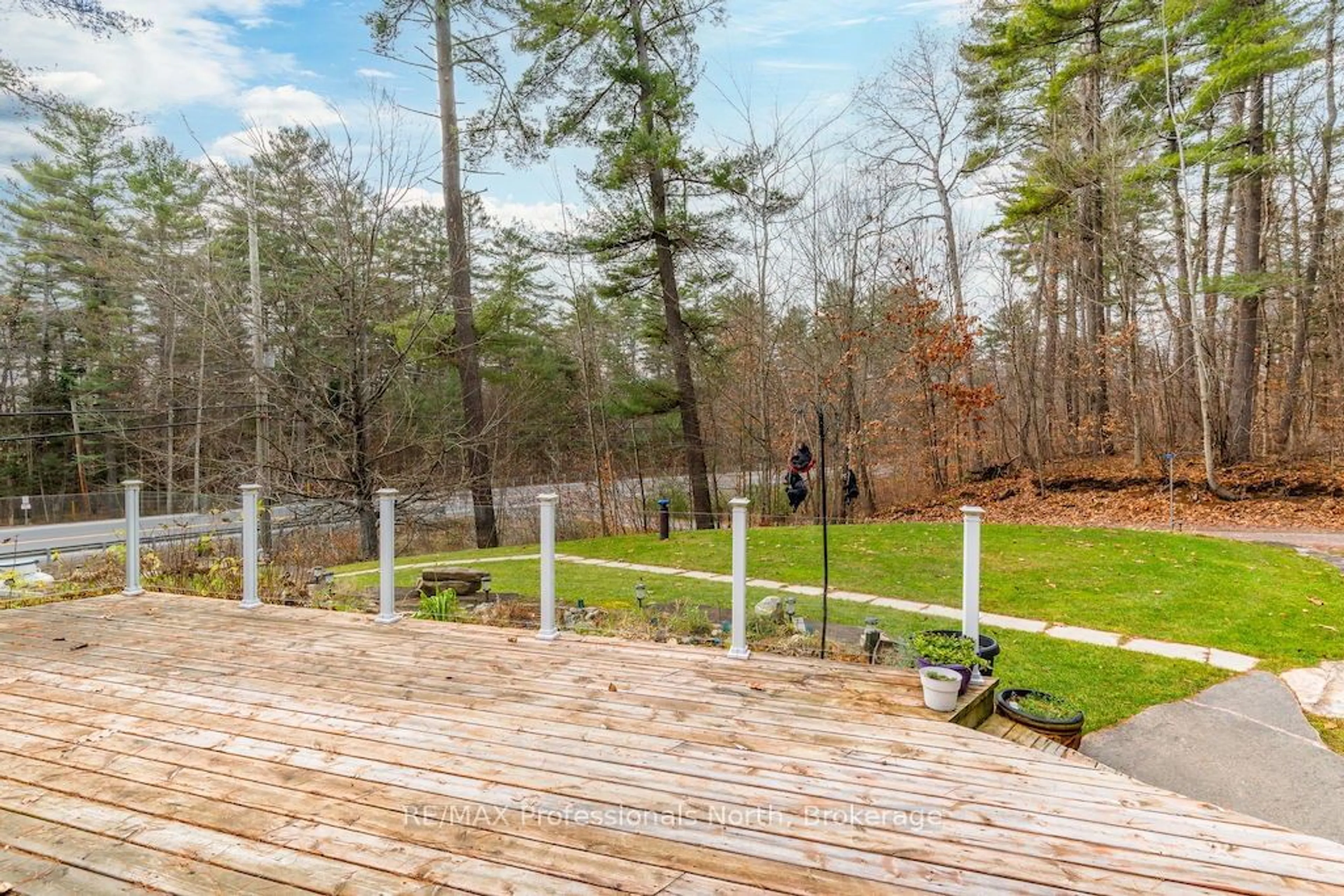 Patio, the fenced backyard for 1012 Parasol Dr, Algonquin Highlands Ontario K0M 1J2