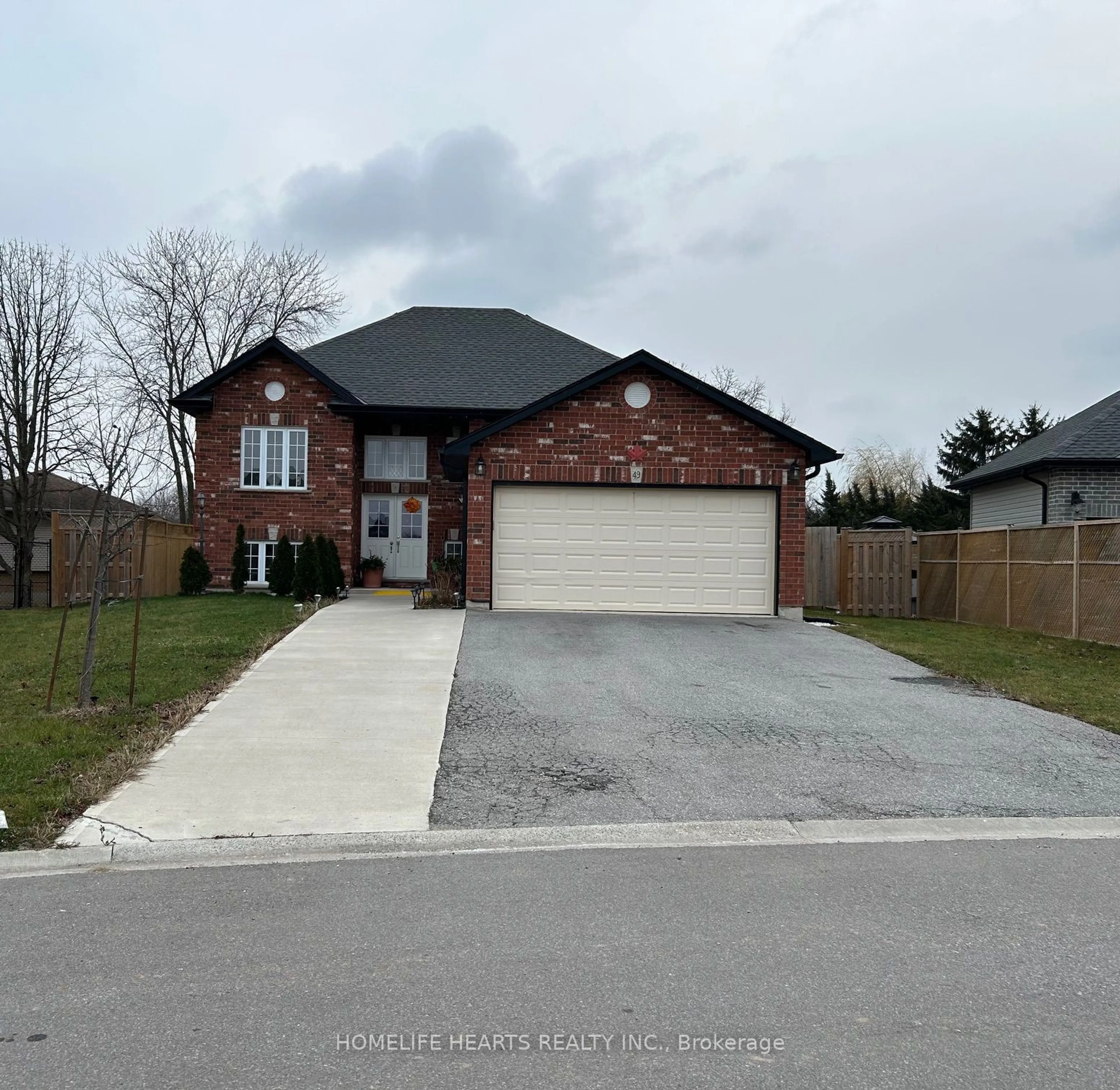 Frontside or backside of a home, the street view for 49 Dennis Dr, Norwich Ontario N0J 1P0