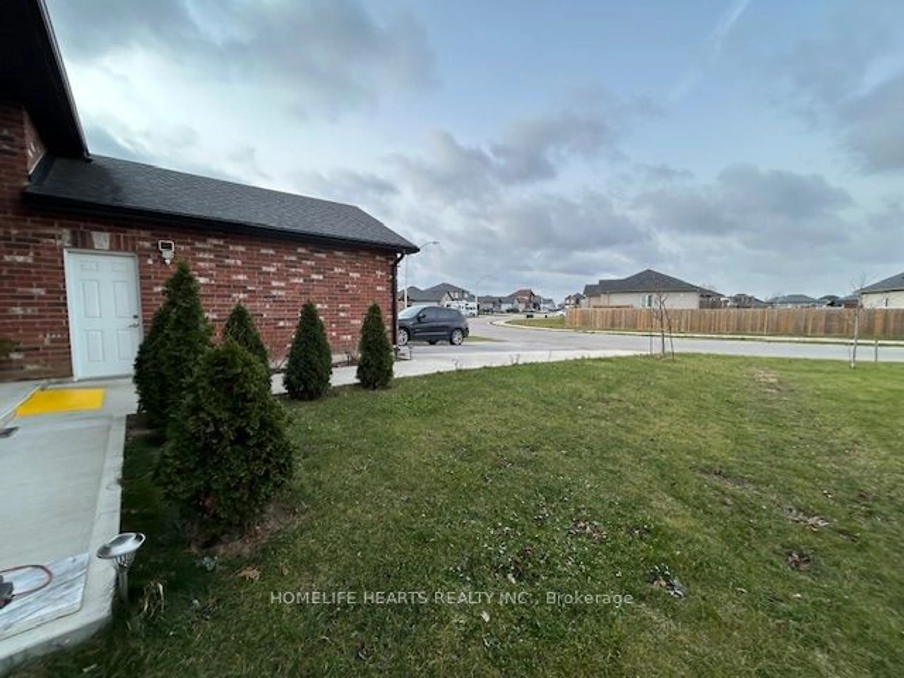 Frontside or backside of a home, the fenced backyard for 49 Dennis Dr, Norwich Ontario N0J 1P0