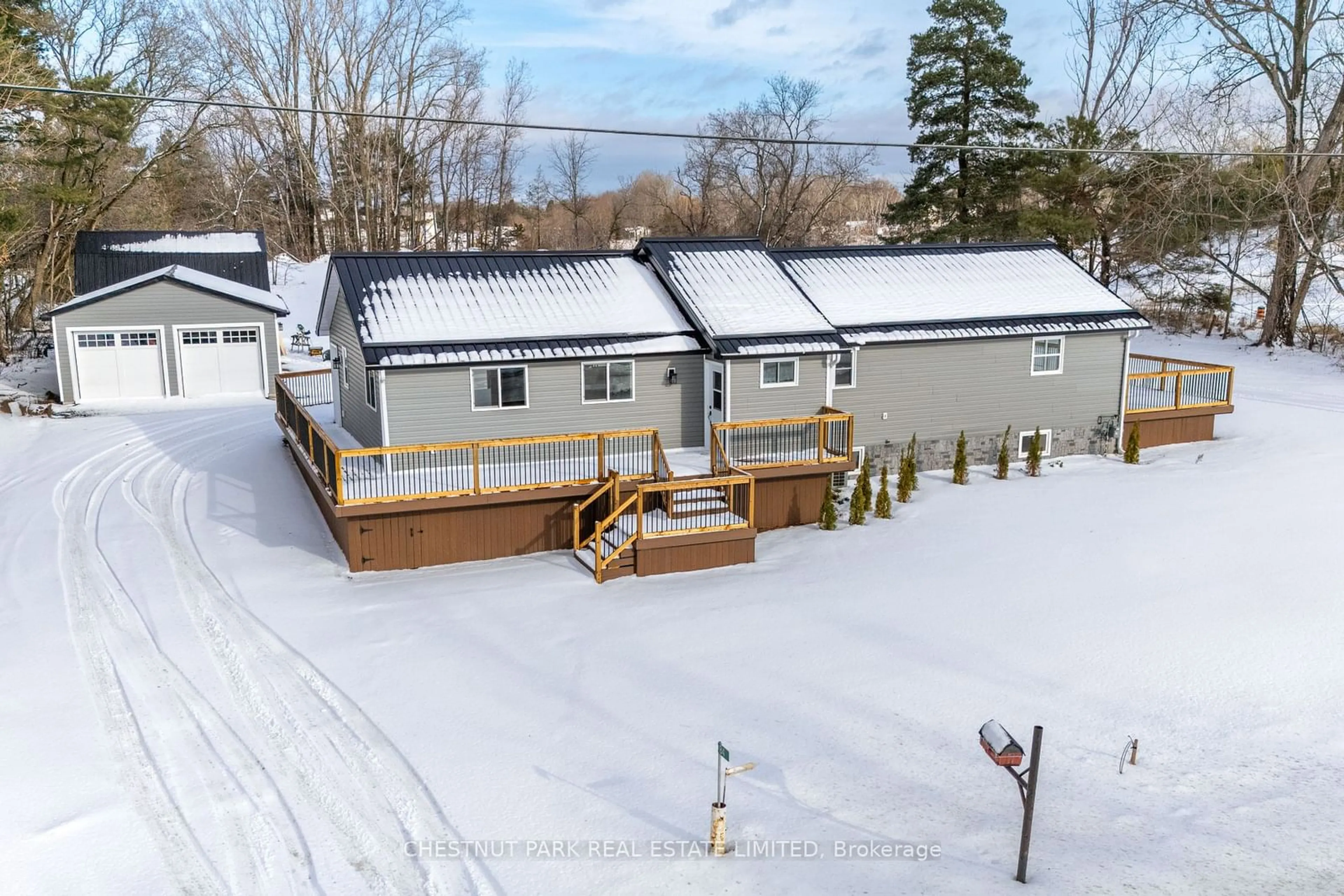 Frontside or backside of a home, the fenced backyard for 84 County Road 1, Prince Edward County Ontario K0K 2T0