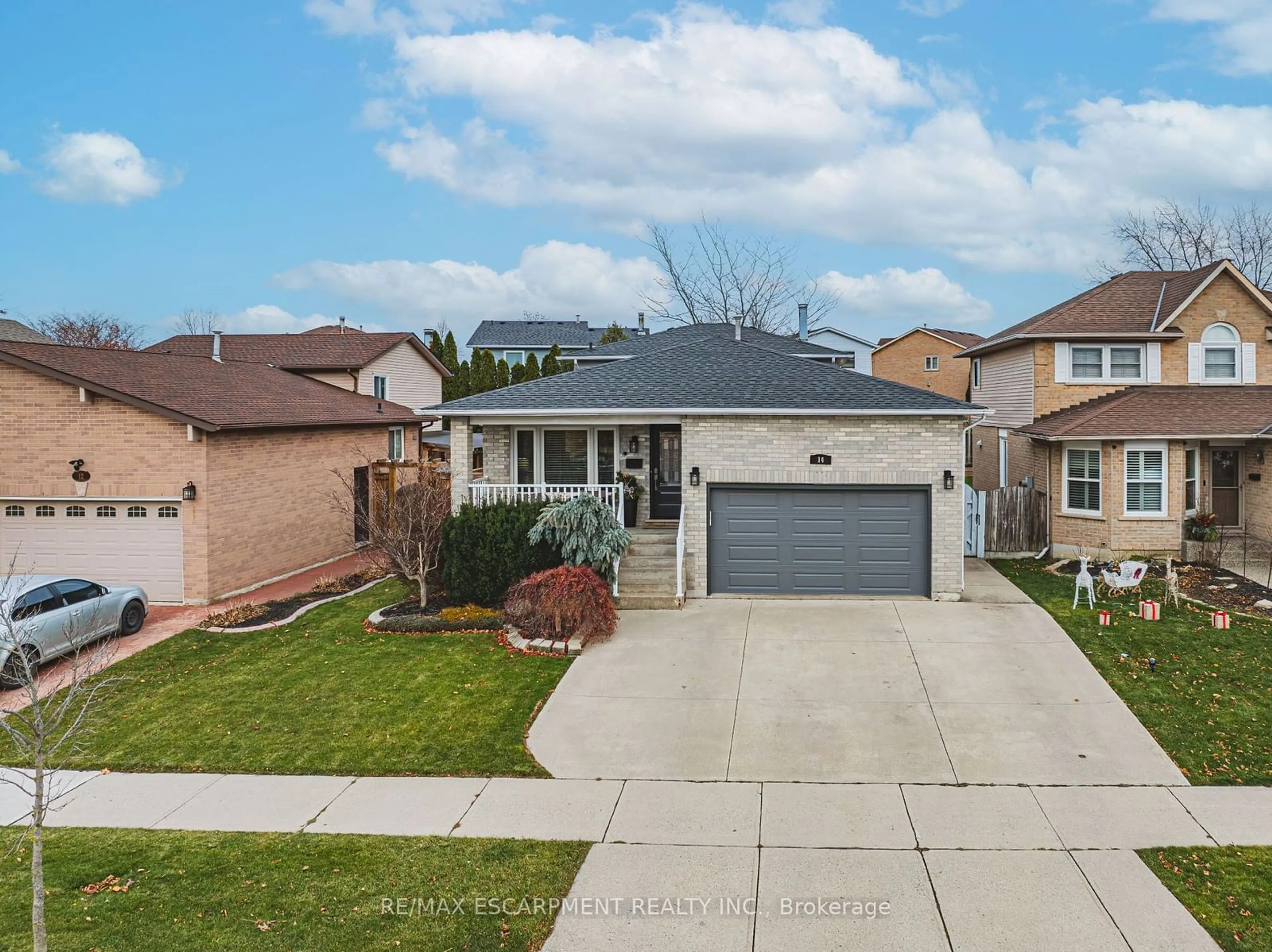 Frontside or backside of a home, the street view for 14 Gatestone Dr, Hamilton Ontario L8J 2N9