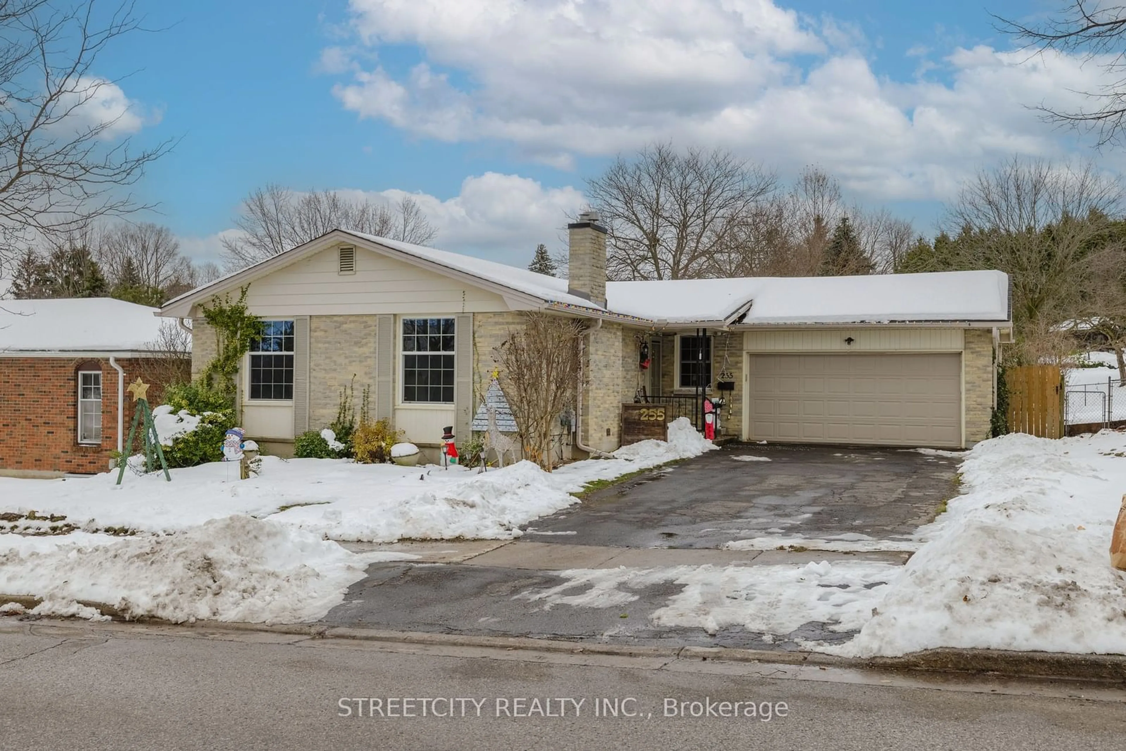 Frontside or backside of a home, the street view for 255 Village Green Ave, London Ontario N6J 3Z2