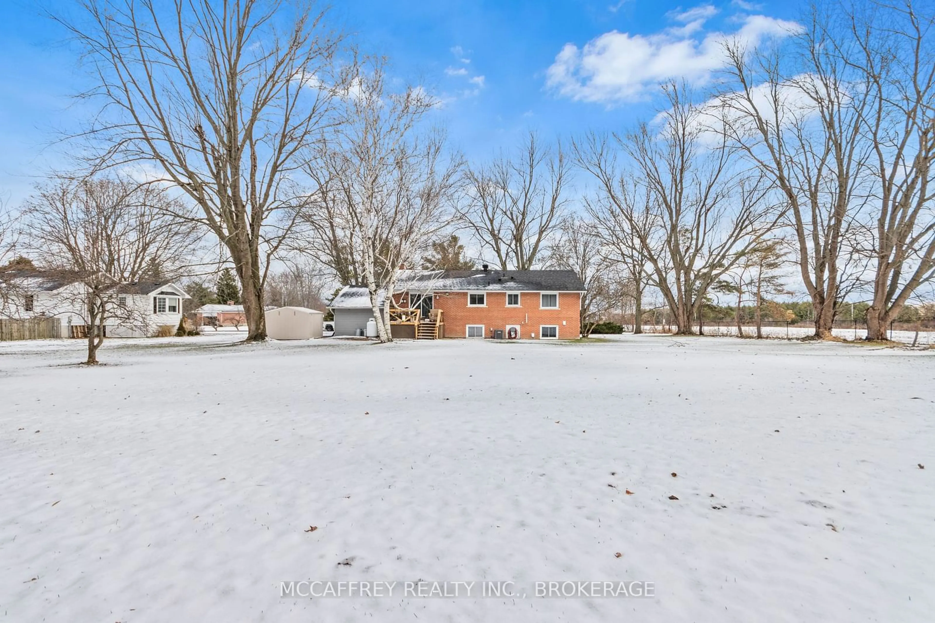 A pic from exterior of the house or condo, the fenced backyard for 102 WRIGHT Pl, Greater Napanee Ontario K0H 1G0