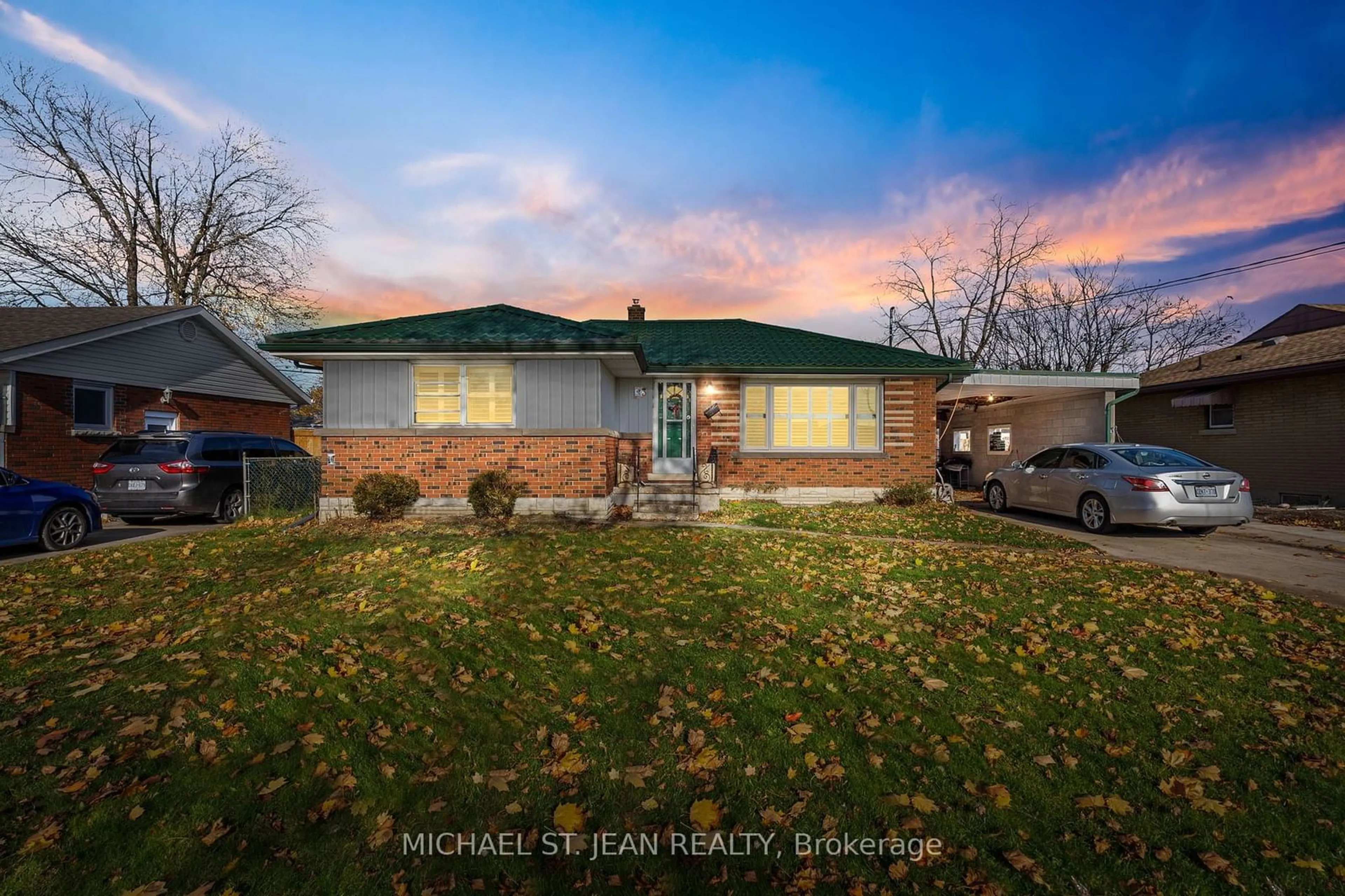 Frontside or backside of a home, the fenced backyard for 3 Broadmore Ave, St. Catharines Ontario L2M 6A4