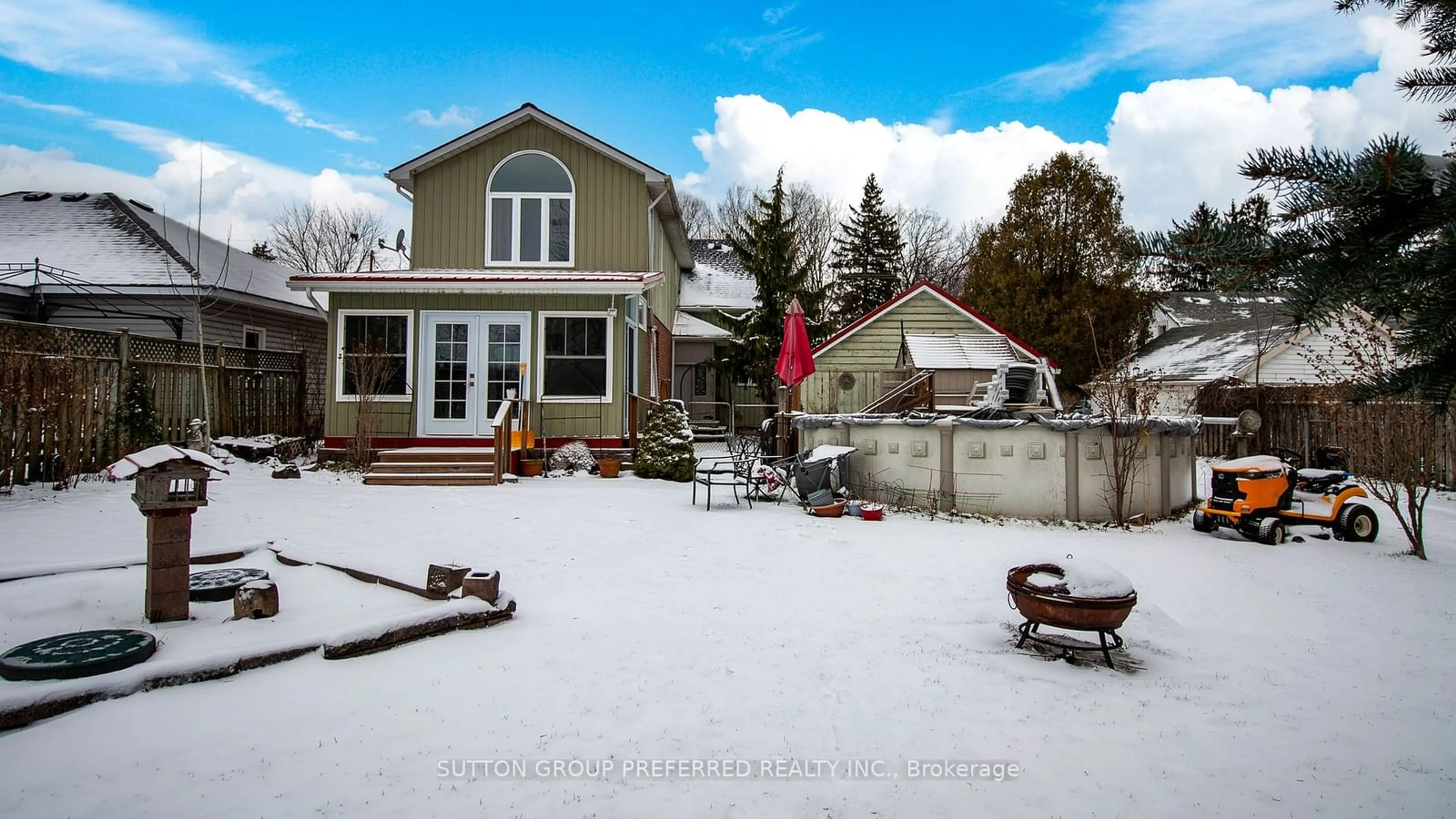 Frontside or backside of a home, the fenced backyard for 50 Potters Rd, Tillsonburg Ontario N4G 2G8