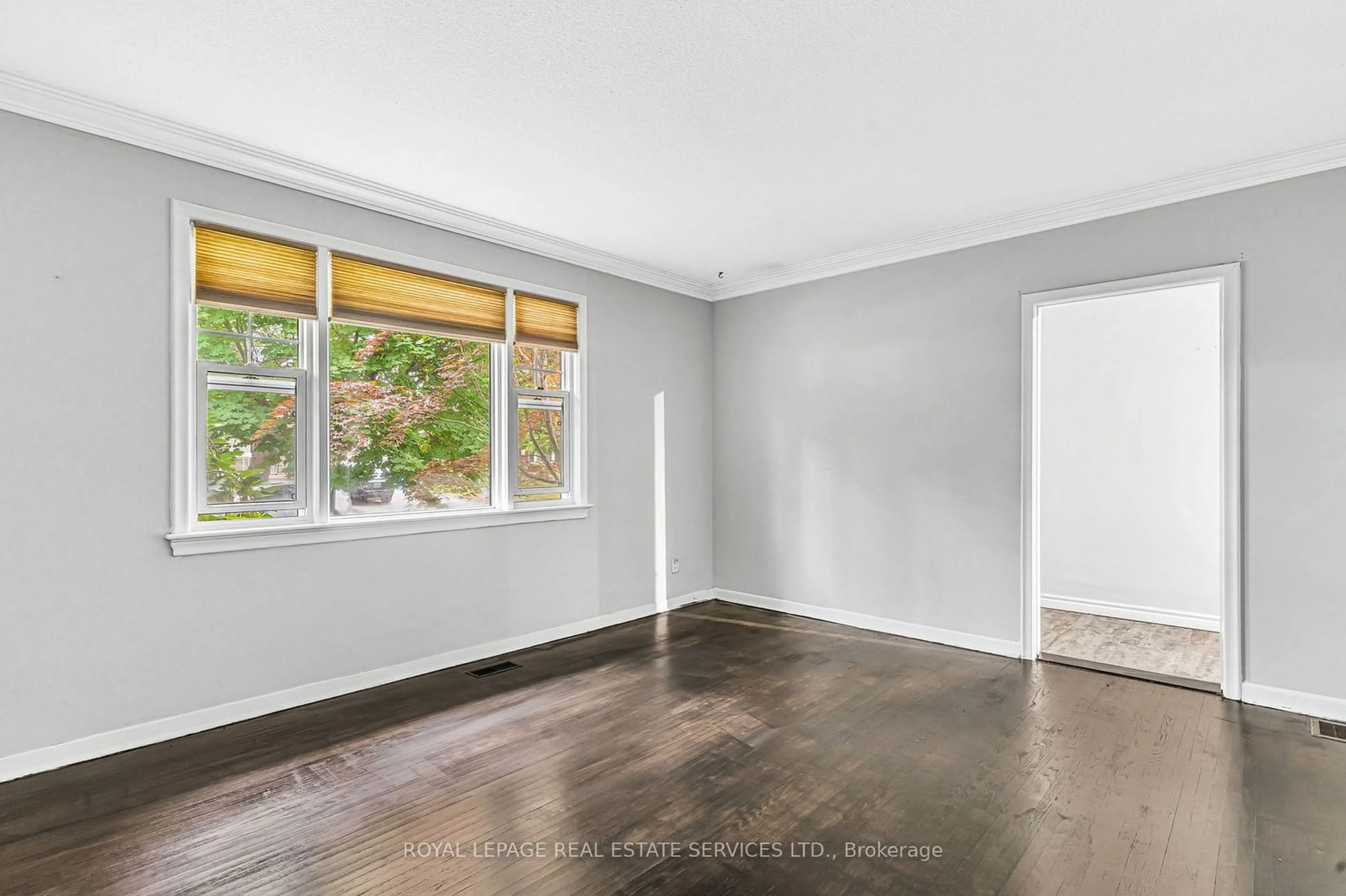 A pic of a room, wood floors for 21 Chalmers St, St. Catharines Ontario L2M 5C7