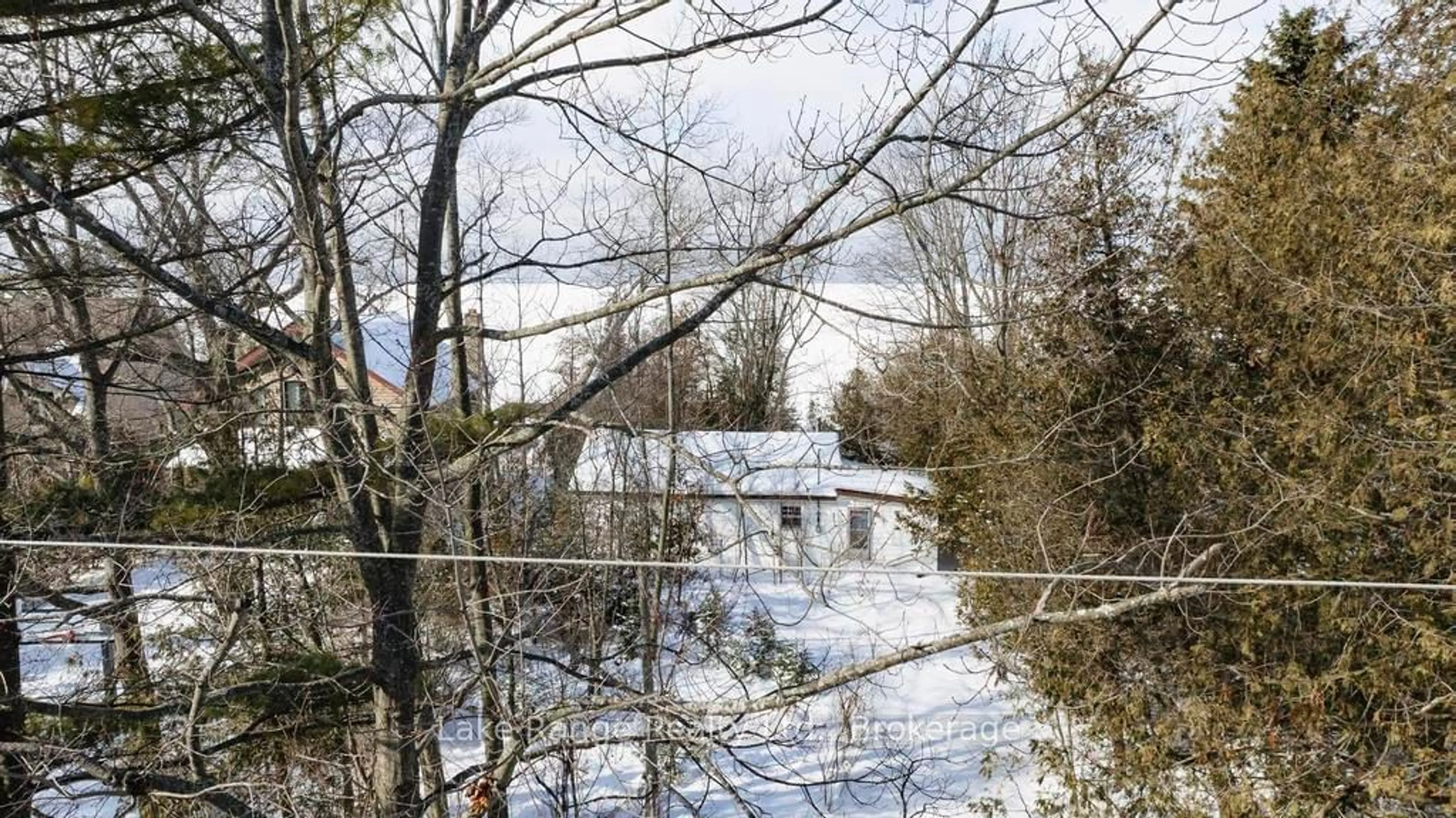 A pic from outside/outdoor area/front of a property/back of a property/a pic from drone, forest/trees view for 667 Lakeside Tr, Huron-Kinloss Ontario N0G 2R0