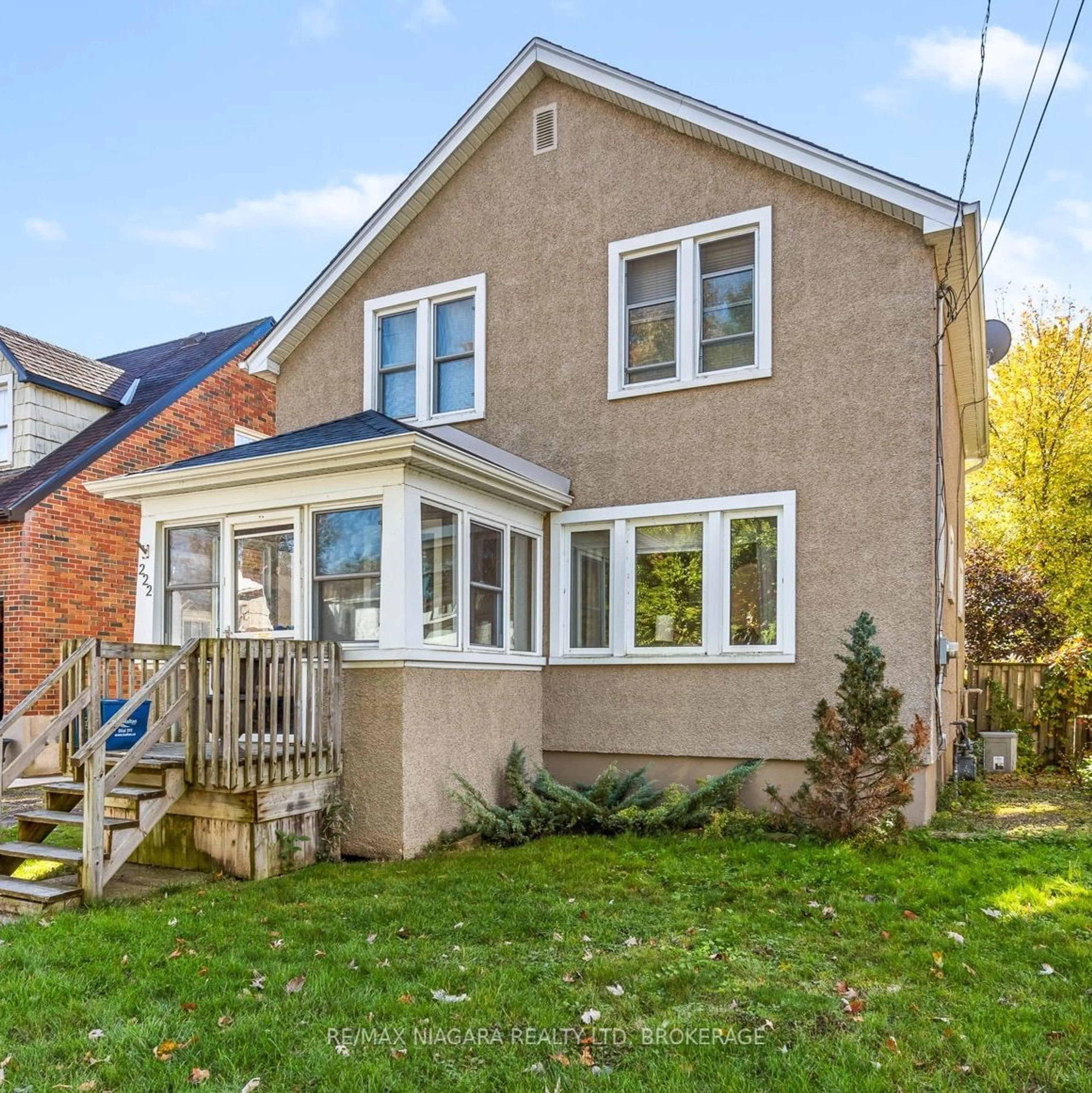 Frontside or backside of a home, the fenced backyard for 222 Alexandra St, Port Colborne Ontario L3K 2Y8