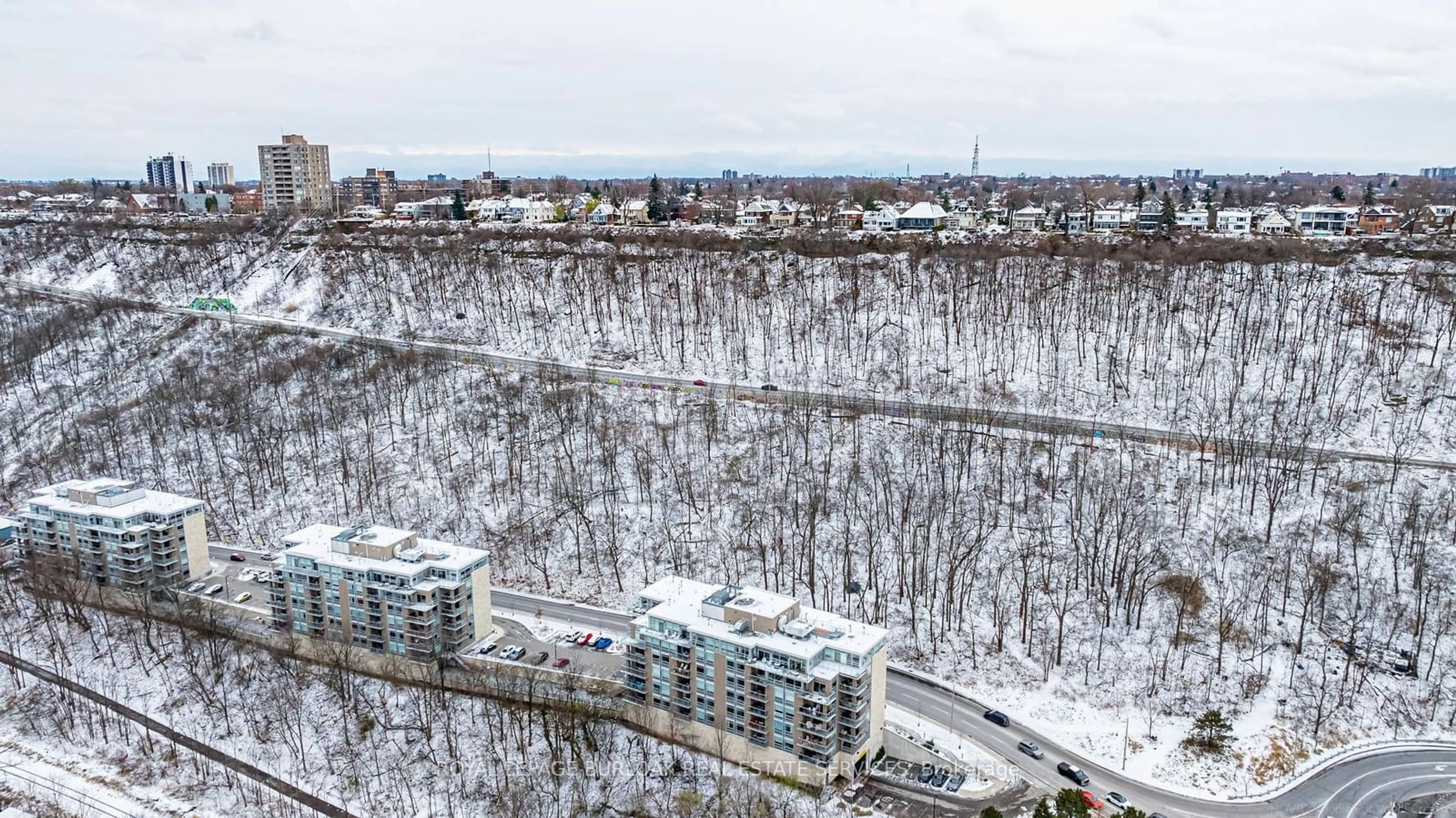 A pic from exterior of the house or condo, the view of city buildings for 455 Charlton Ave #206, Hamilton Ontario L8N 0B2