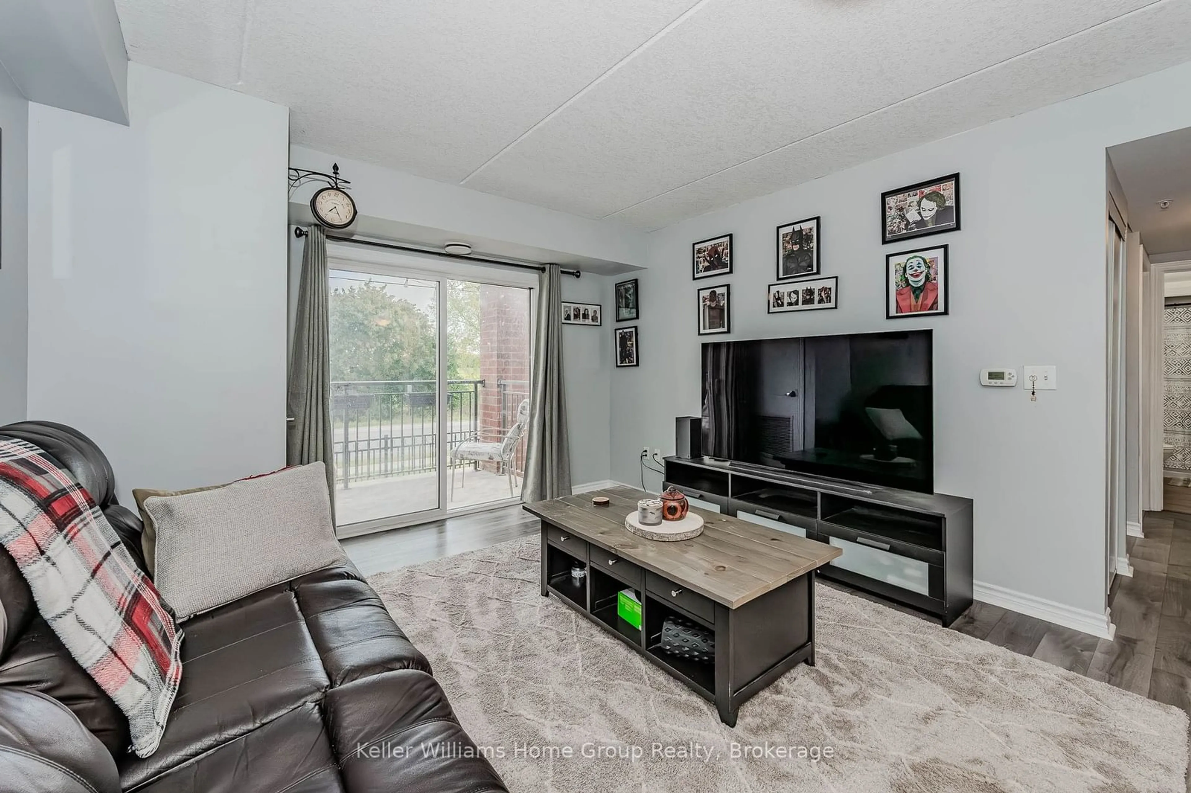 Living room, wood floors for 60 Lynnmore St #201, Guelph Ontario N1L 0J8