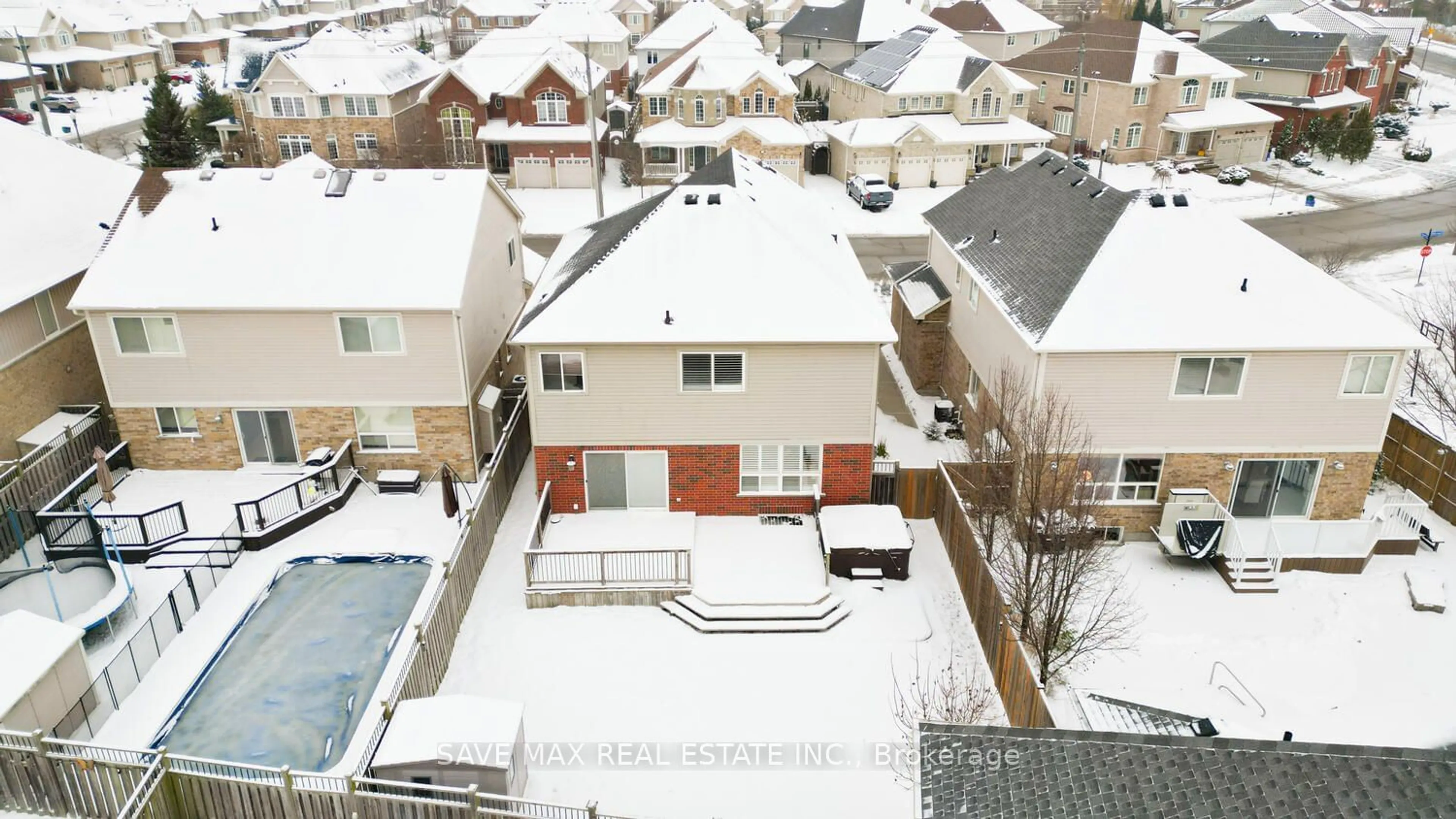 A pic from exterior of the house or condo, the fenced backyard for 319 Robert Ferrie Dr, Kitchener Ontario N2P 2Y7