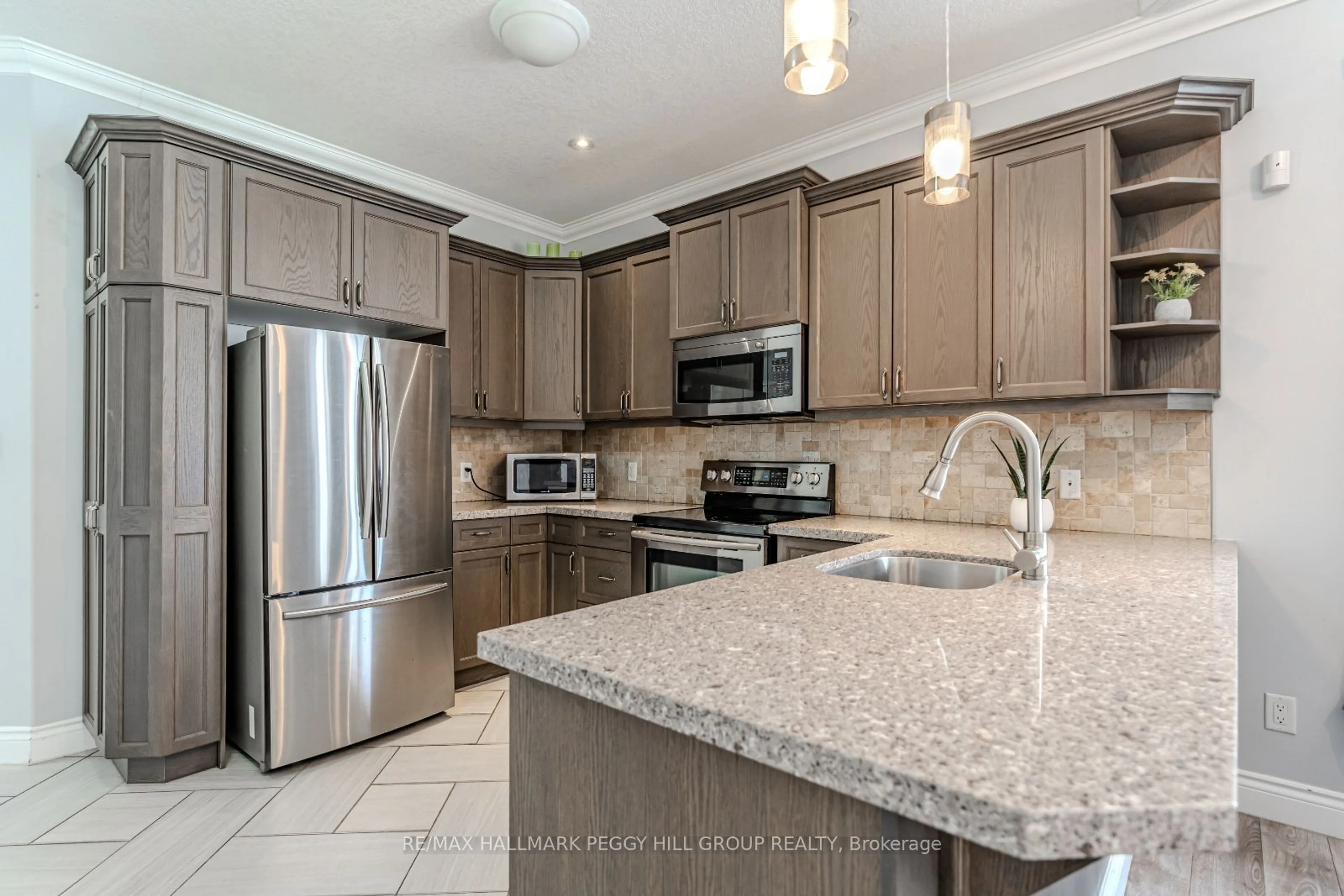 Open concept kitchen for 2 Jordan Lane, Huntsville Ontario P1H 1K9