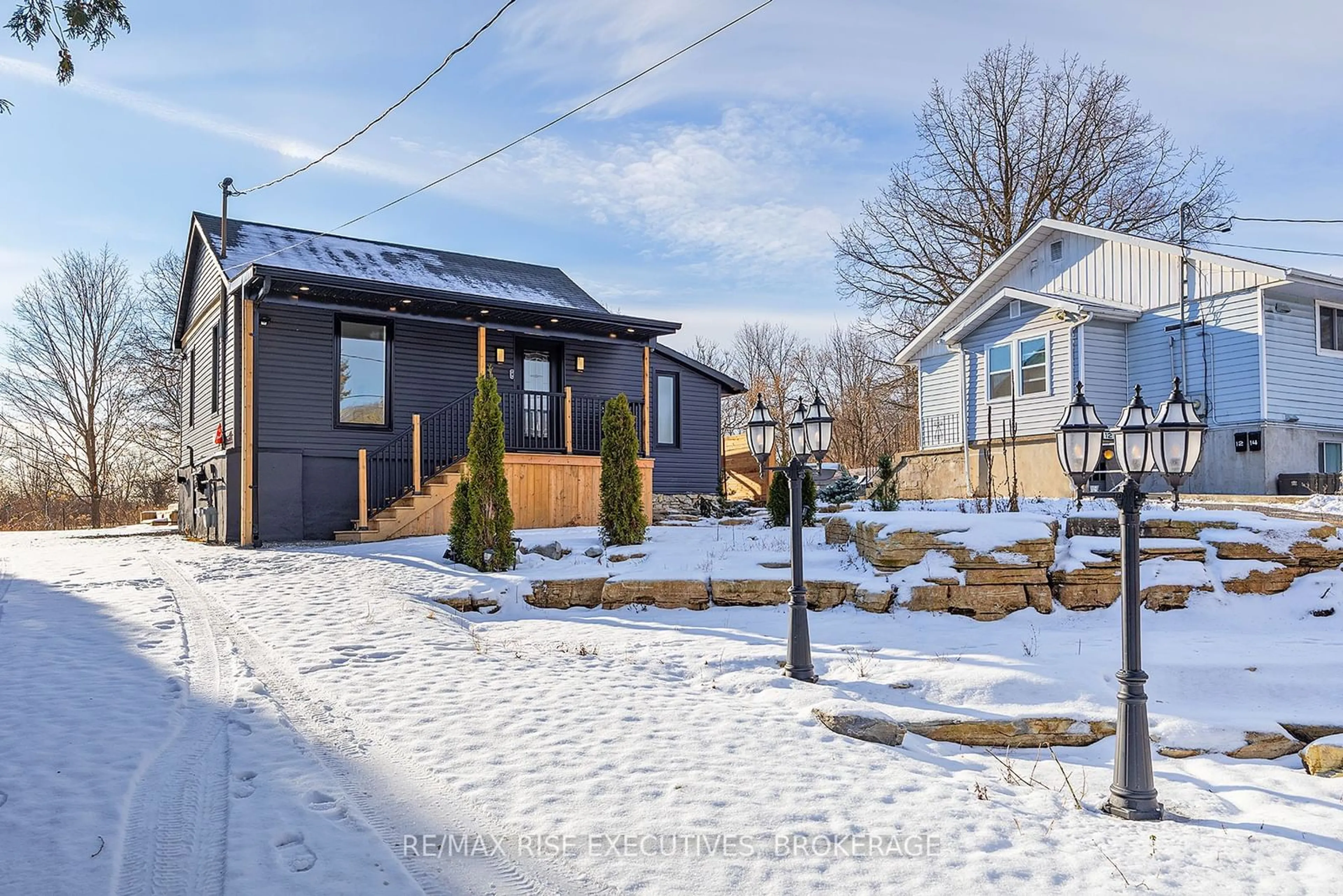 Frontside or backside of a home, the fenced backyard for 10 Greer St, Kingston Ontario K7K 2V9