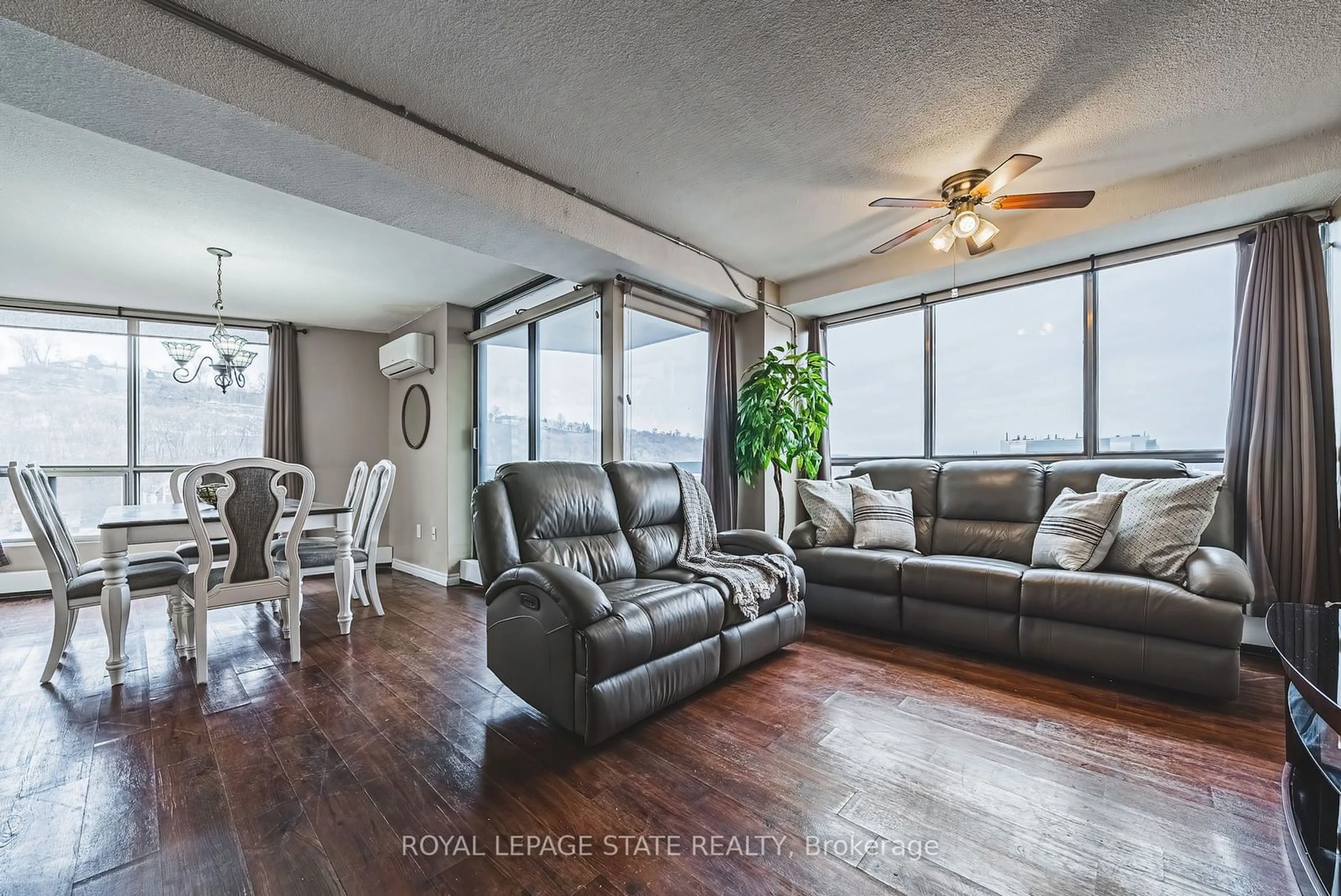 Living room, wood floors for 150 Charlton Ave #1908, Hamilton Ontario L8N 3X3