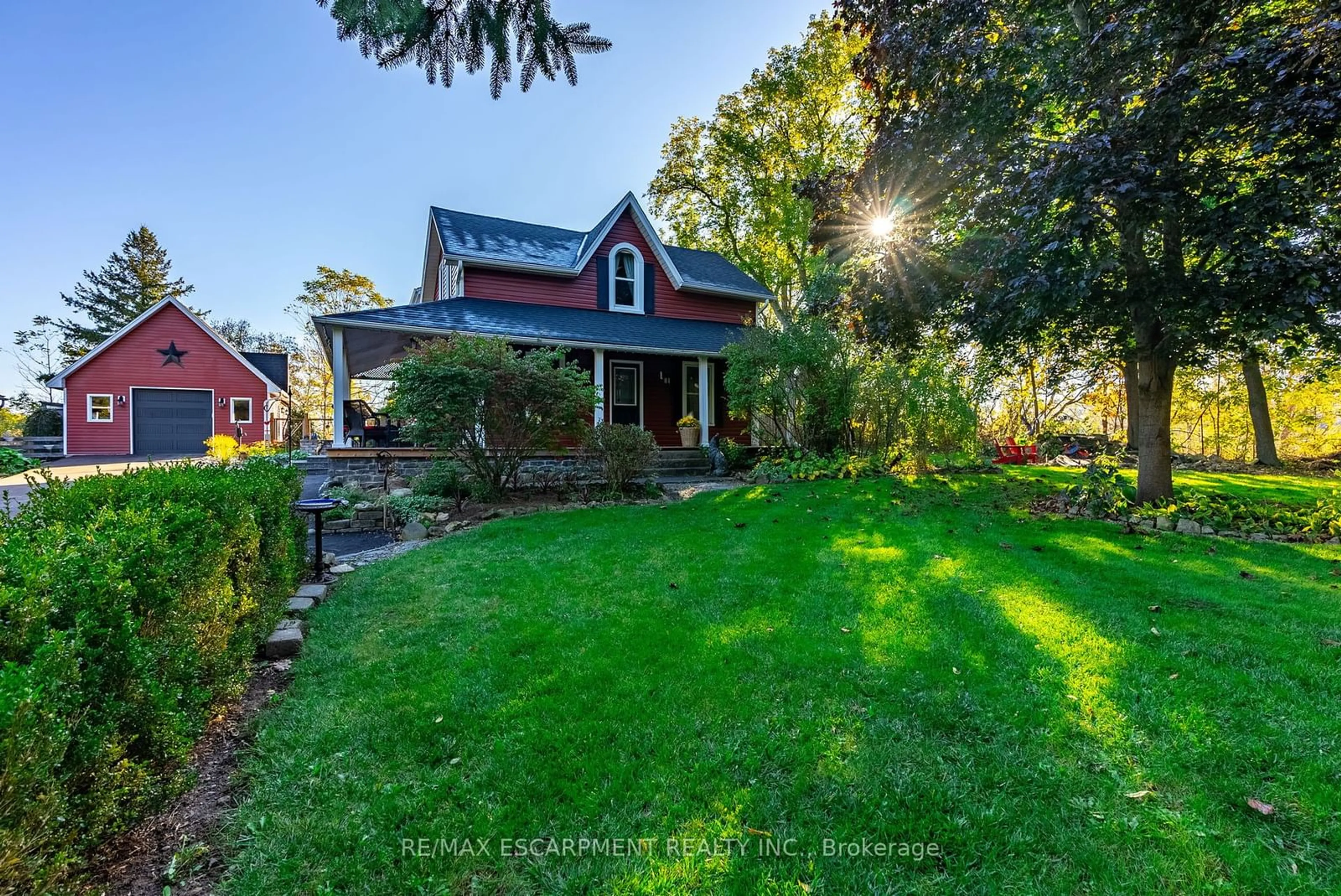 Frontside or backside of a home, the fenced backyard for 1304 Brock Rd, Hamilton Ontario L9H 5E4