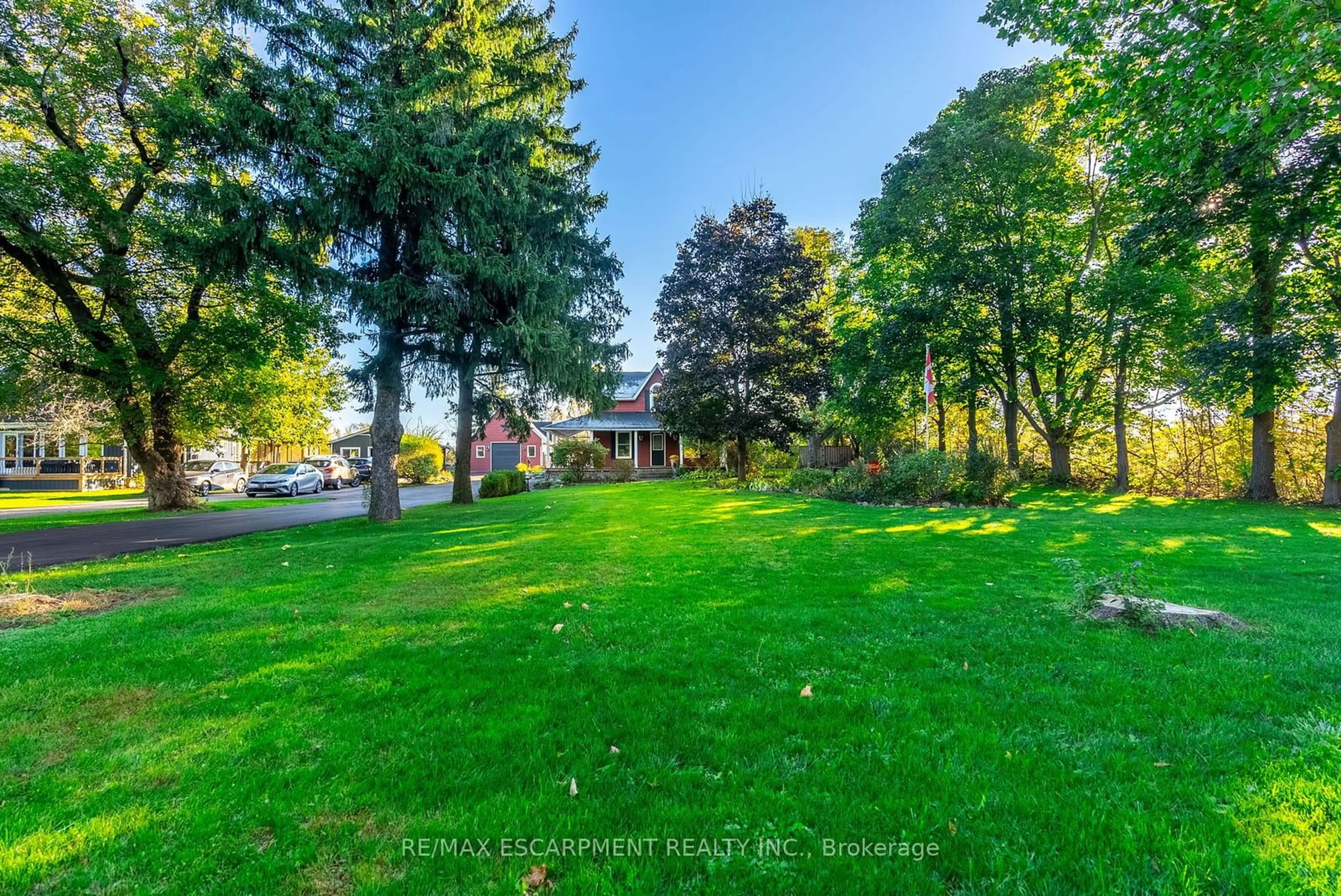 A pic from exterior of the house or condo, the fenced backyard for 1304 Brock Rd, Hamilton Ontario L9H 5E4