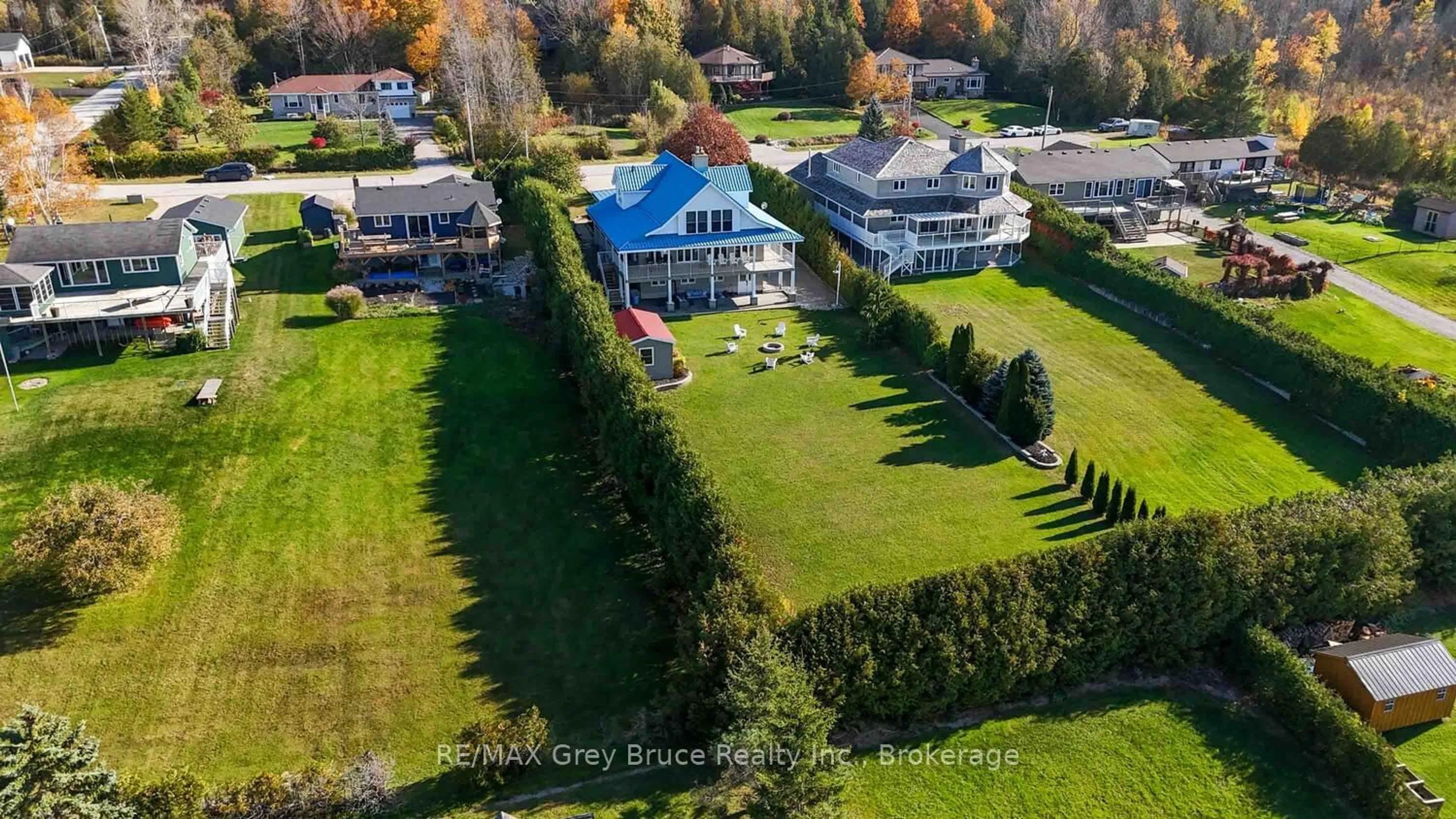 A pic from exterior of the house or condo, the fenced backyard for 151 Grandore St, Georgian Bluffs Ontario N0H 2T0