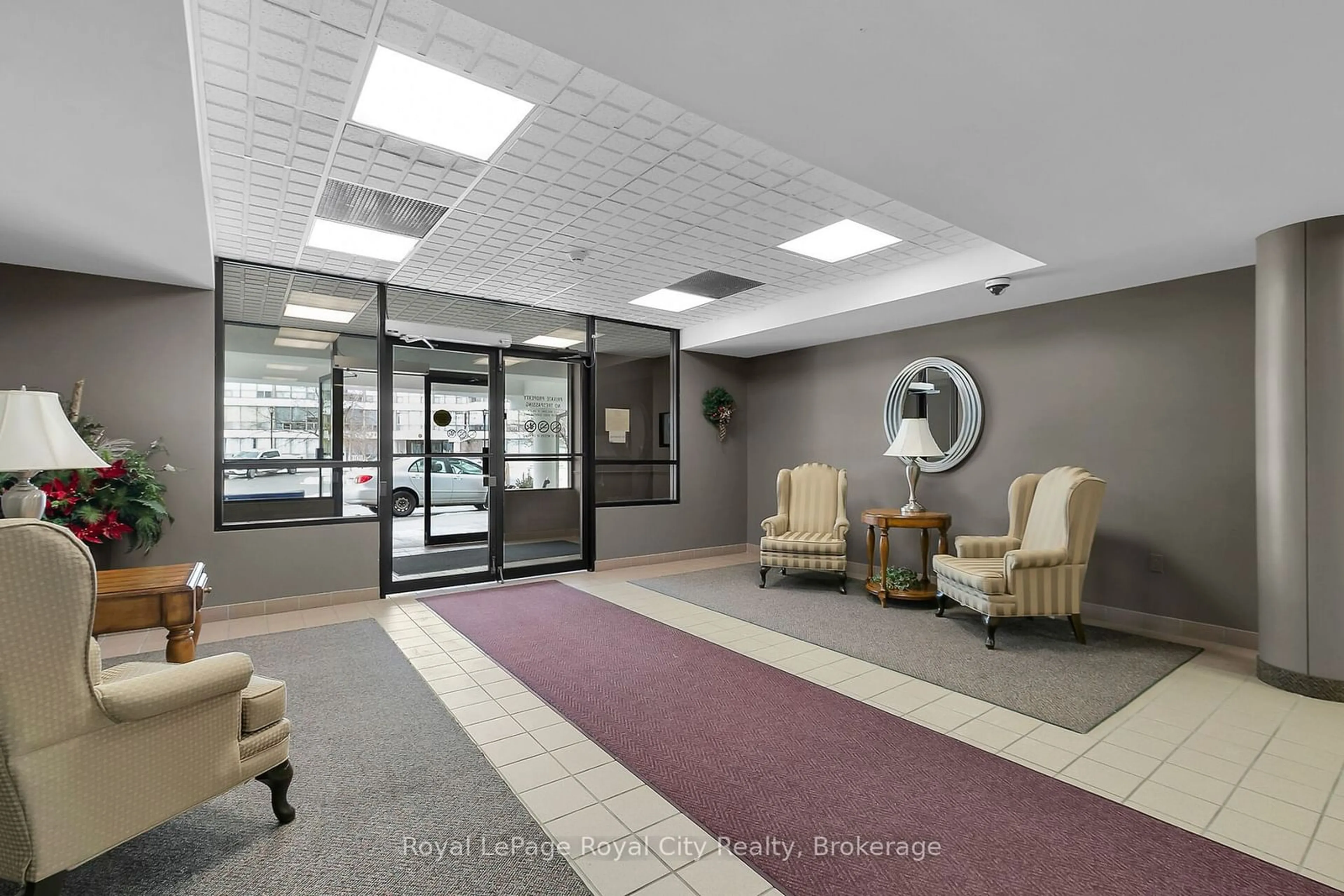 Indoor lobby, carpet floors for 105 Bagot St #107, Guelph Ontario N1H 8H4