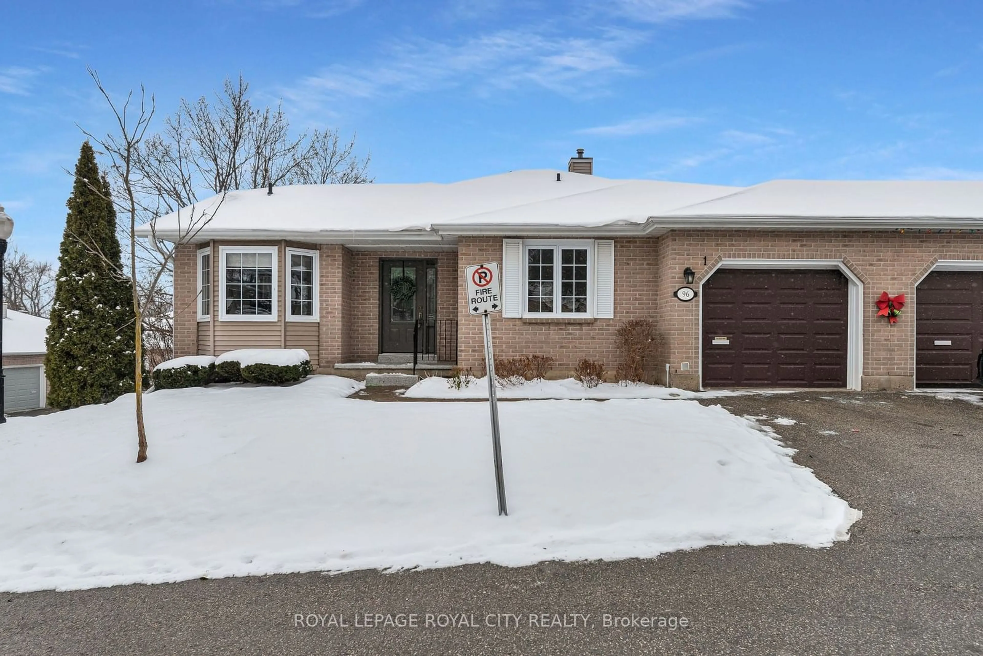 Frontside or backside of a home, the street view for 96 Woodlawn Rd #1, Guelph Ontario N1E 1B7