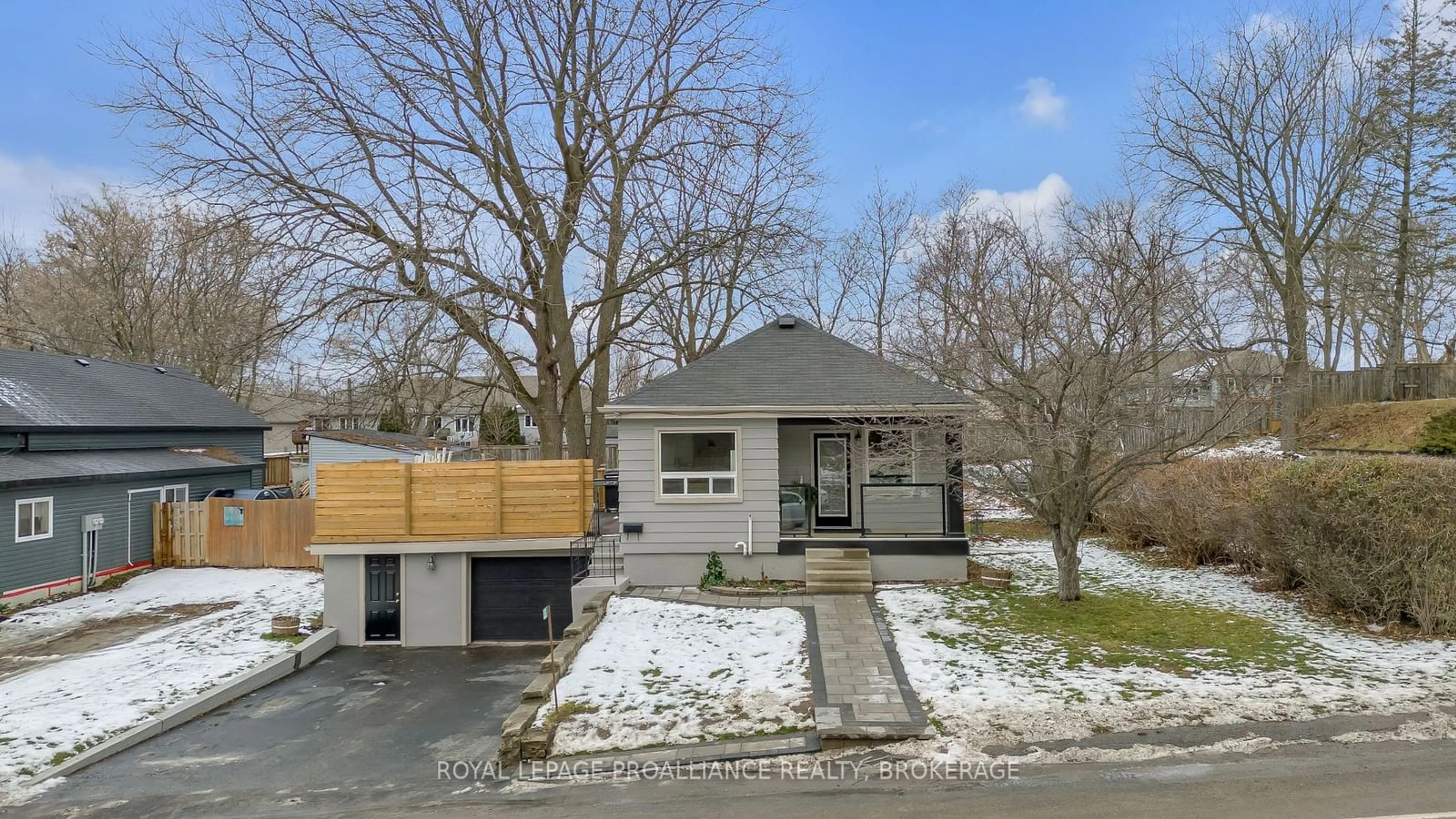 Frontside or backside of a home, the fenced backyard for 951 Sydenham Rd, Kingston Ontario K7M 3L8