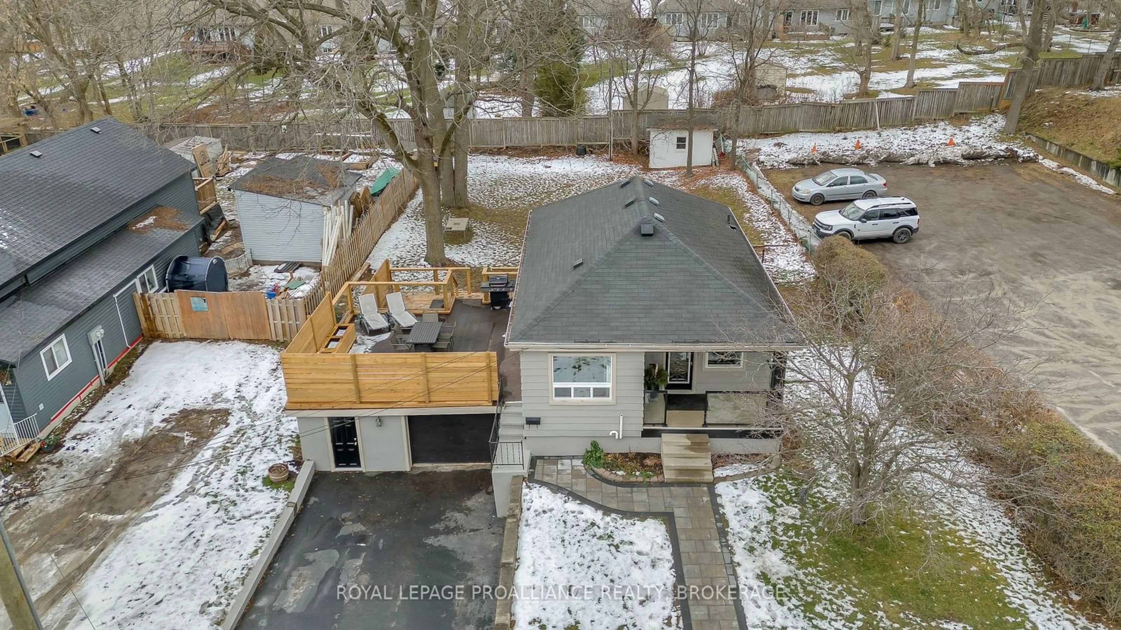 Frontside or backside of a home, the fenced backyard for 951 Sydenham Rd, Kingston Ontario K7M 3L8