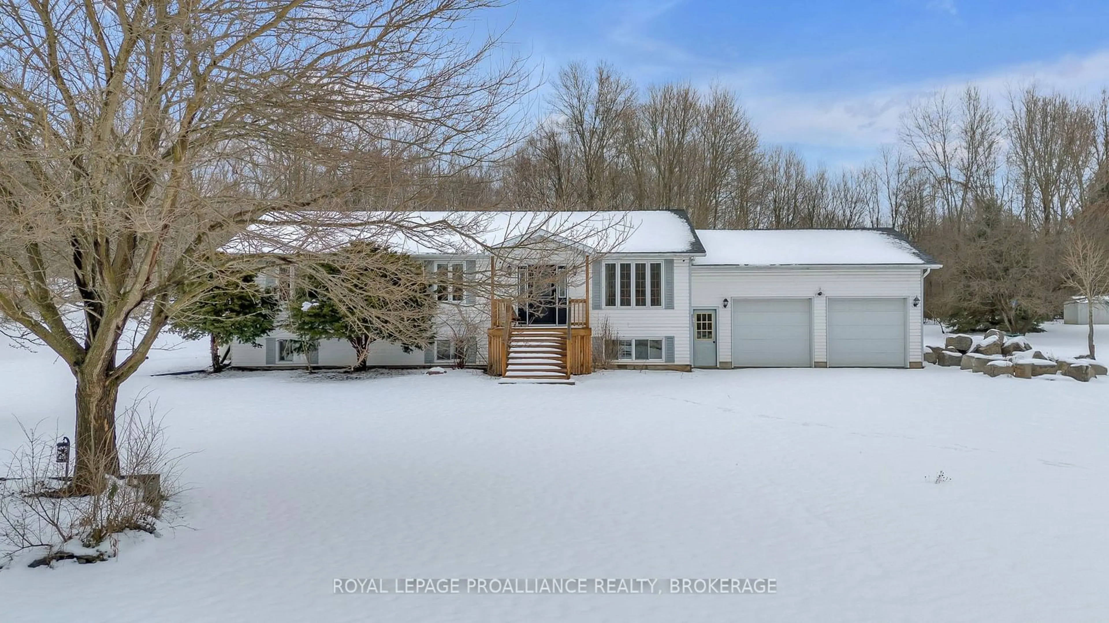 Frontside or backside of a home, the fenced backyard for 6168 REVELL Rd, South Frontenac Ontario K0H 2W0