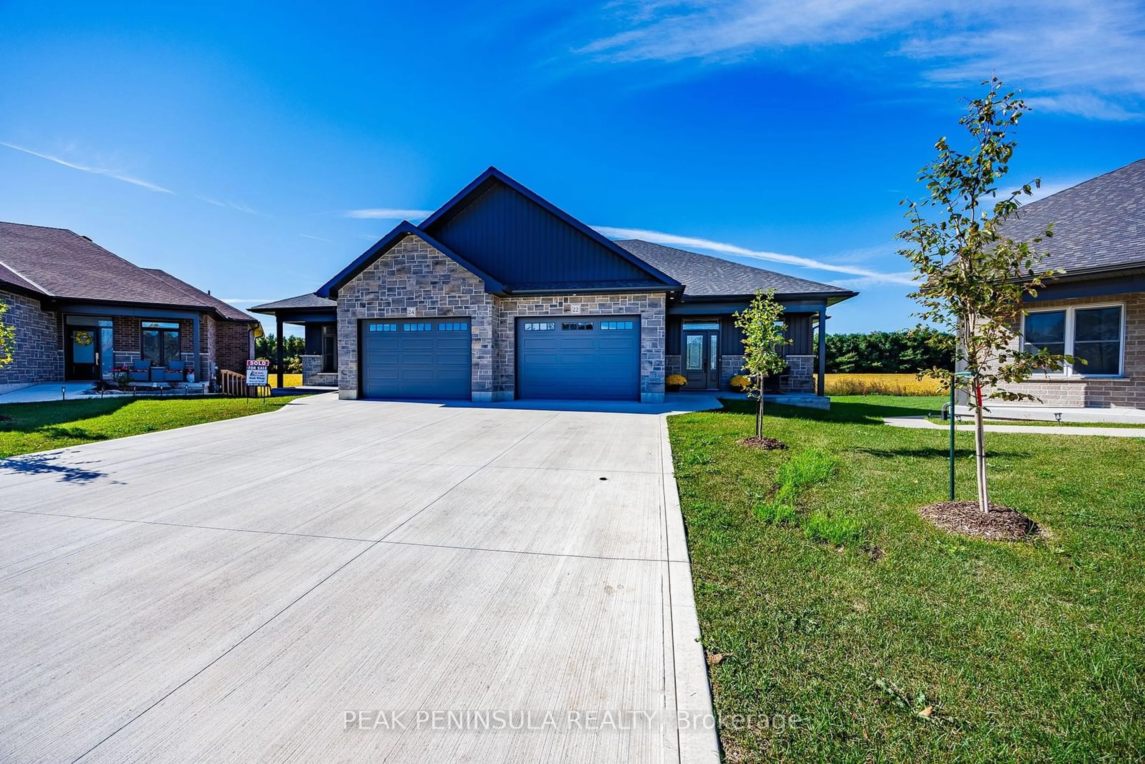 Frontside or backside of a home, the street view for 22 Pintail Lane, Norfolk Ontario N0E 1M0