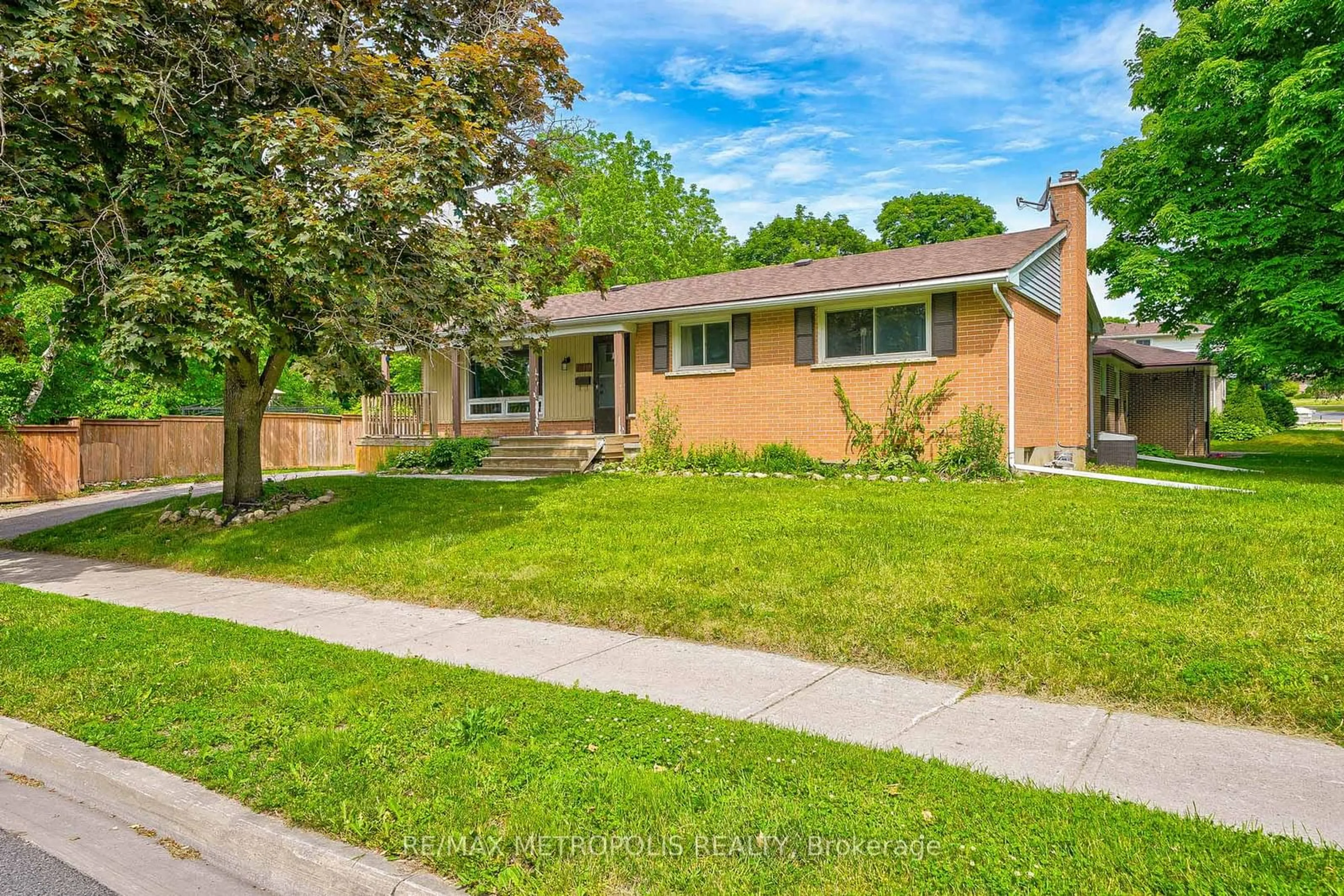 Frontside or backside of a home, the fenced backyard for 1215 Franklin Dr, Peterborough Ontario K9H 6Z1