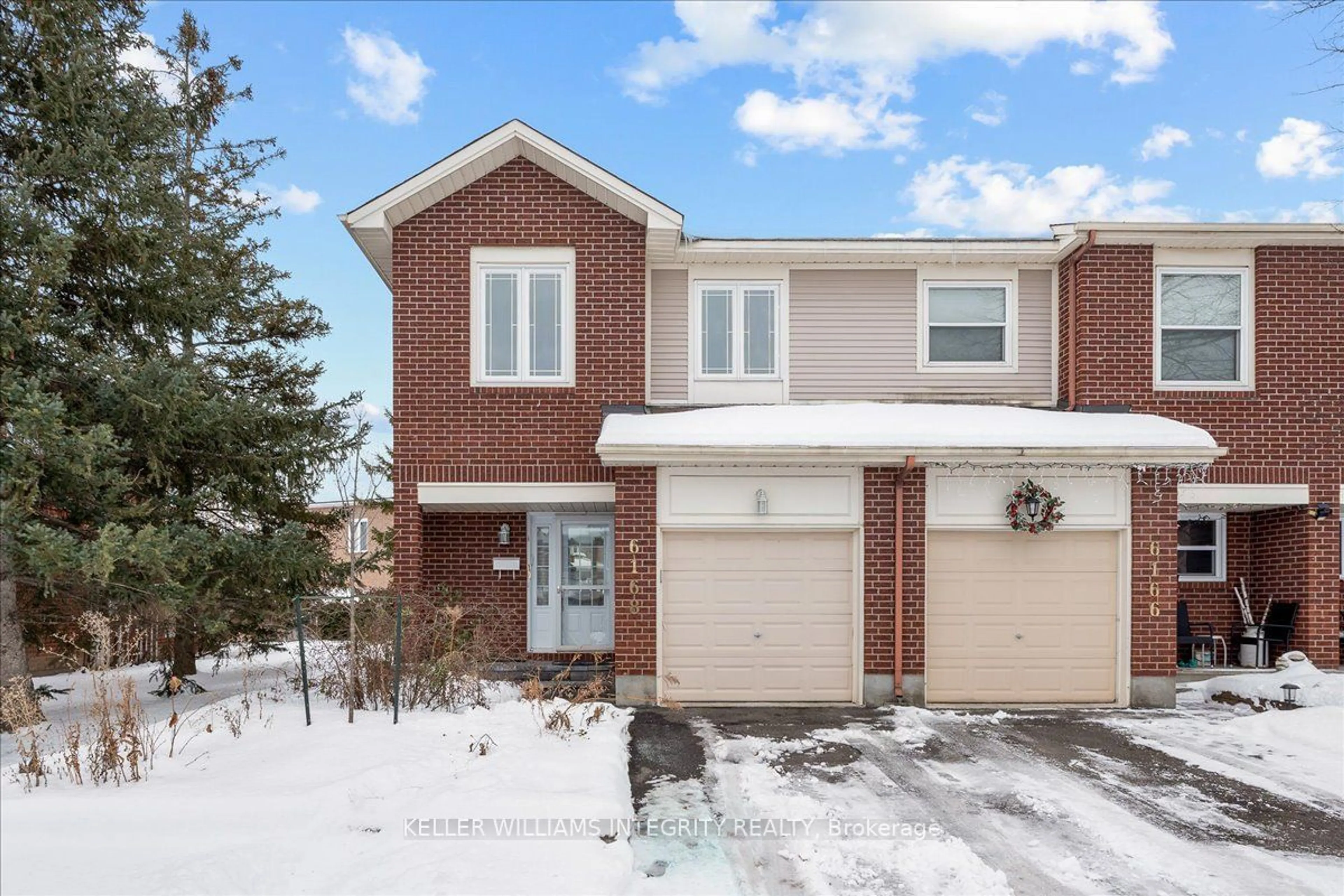 Home with brick exterior material, street for 6168 Oak Meadows Dr #23, Orleans - Convent Glen and Area Ontario K1C 7G8