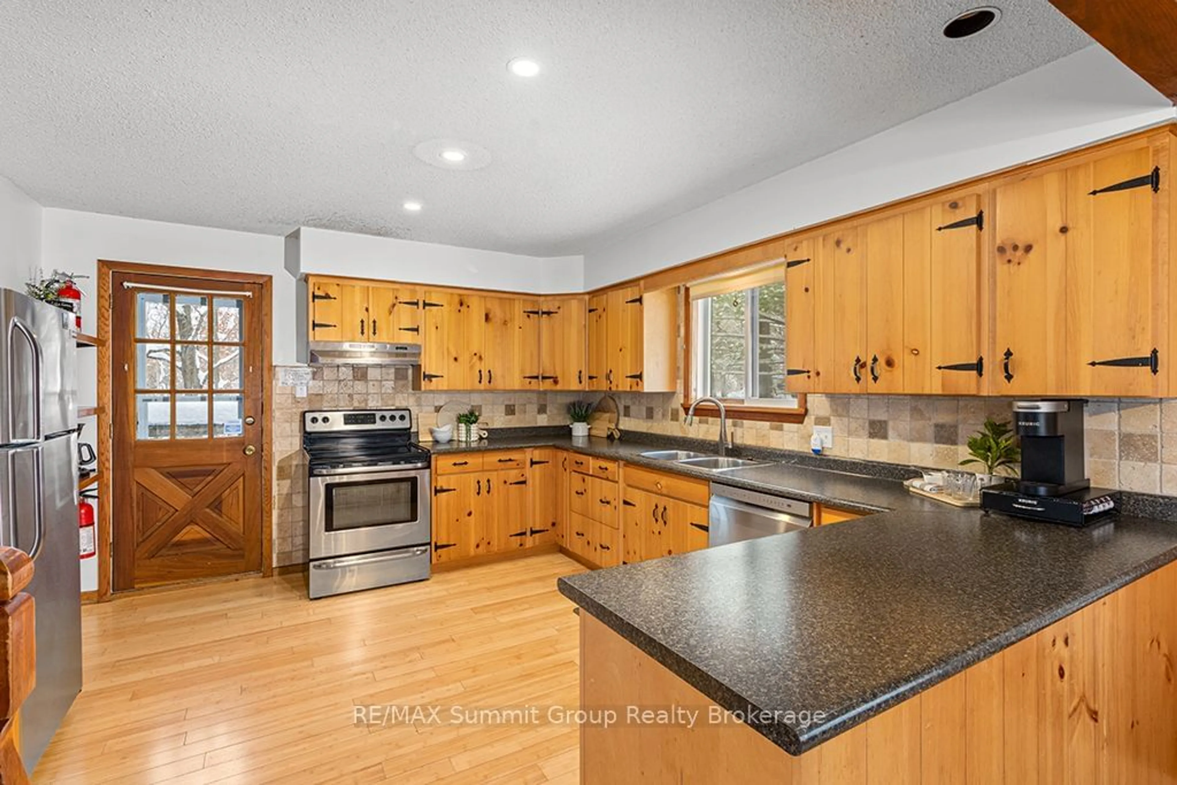 Open concept kitchen, unknown for 144 Talisman Blvd, Grey Highlands Ontario N0C 1G0