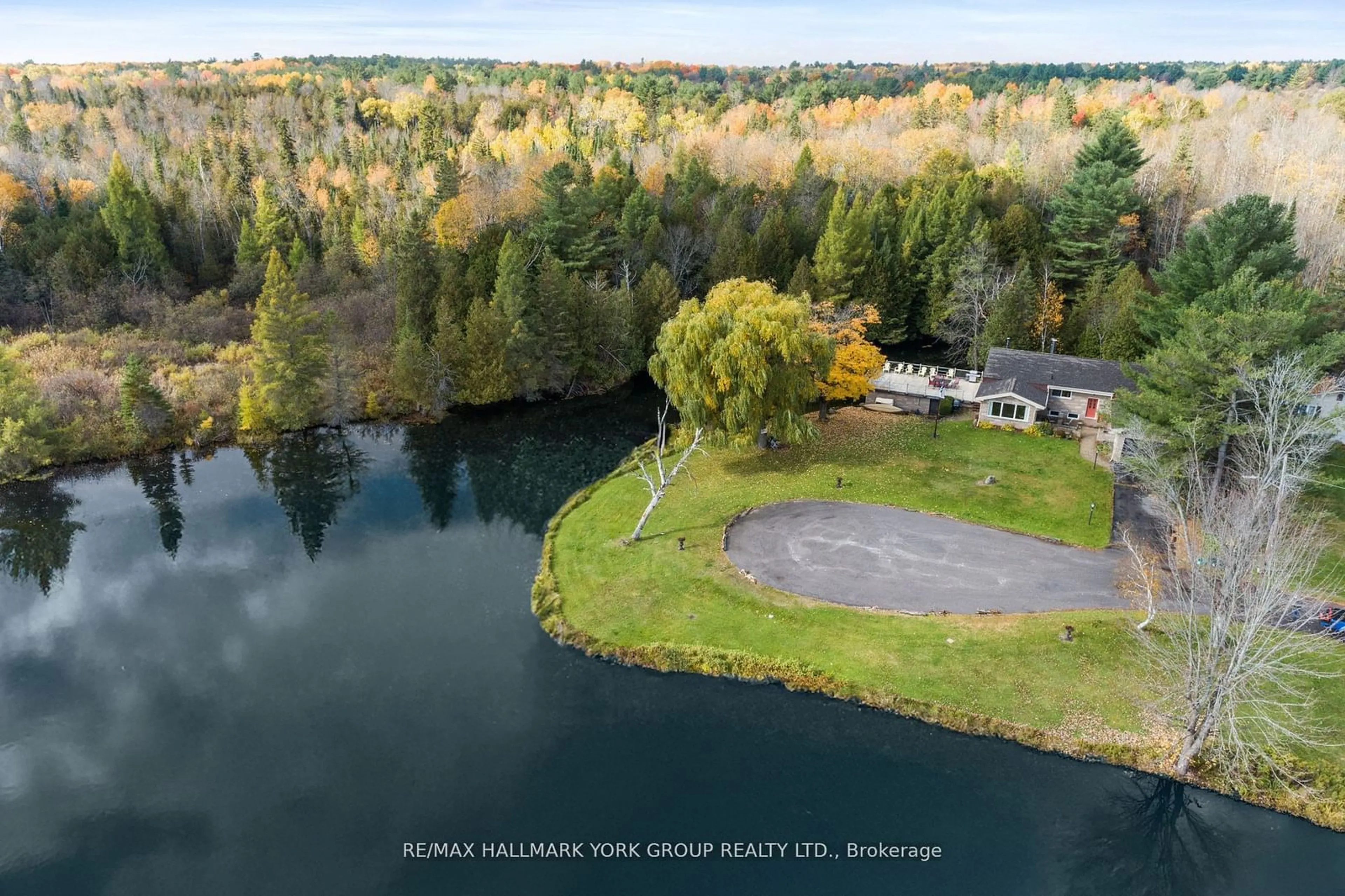 A pic from outside/outdoor area/front of a property/back of a property/a pic from drone, water/lake/river/ocean view for 102 Albert St, Kawartha Lakes Ontario K0M 1K0