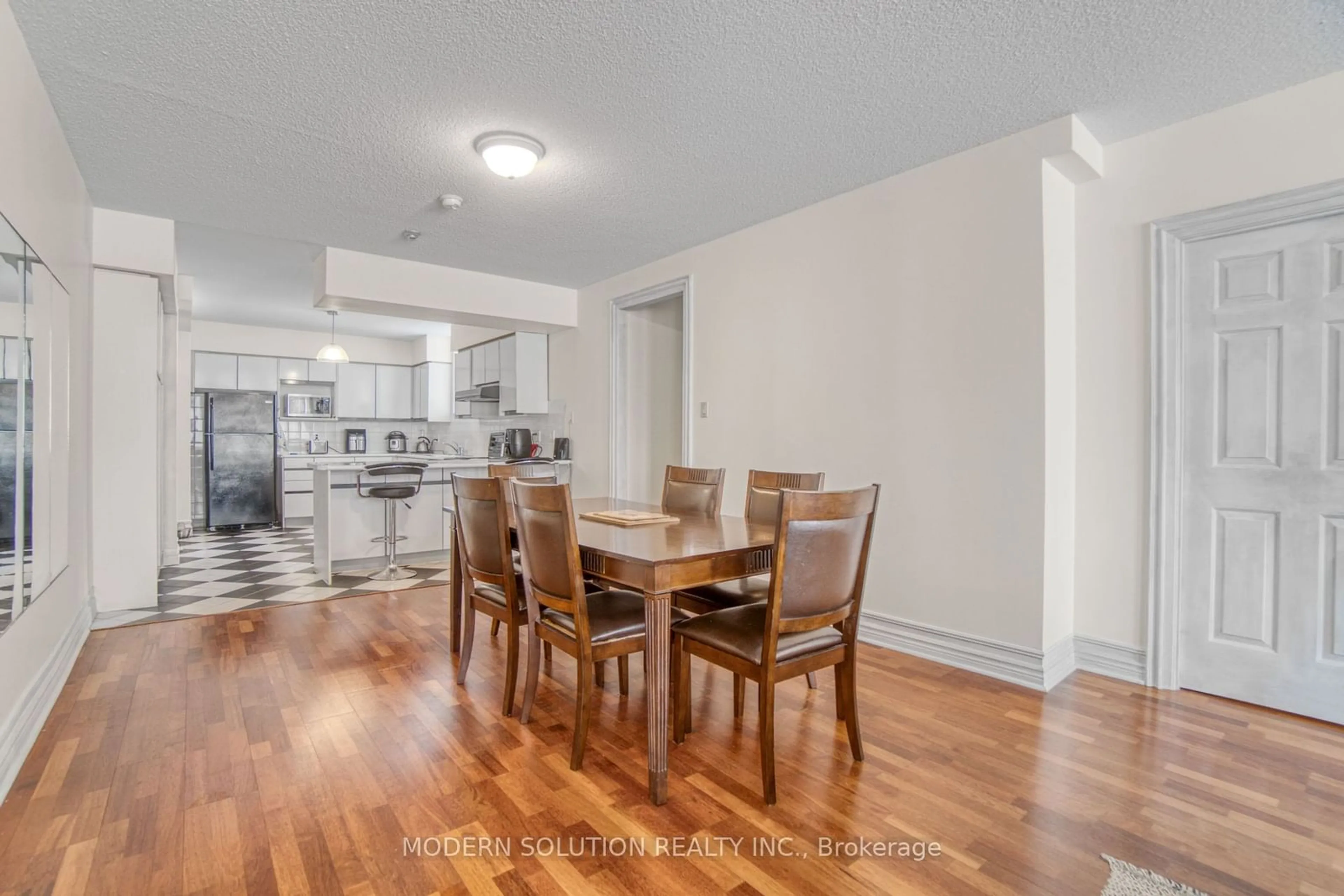 Dining room, wood/laminate floor for 36 James St #302, Hamilton Ontario L8P 4W4