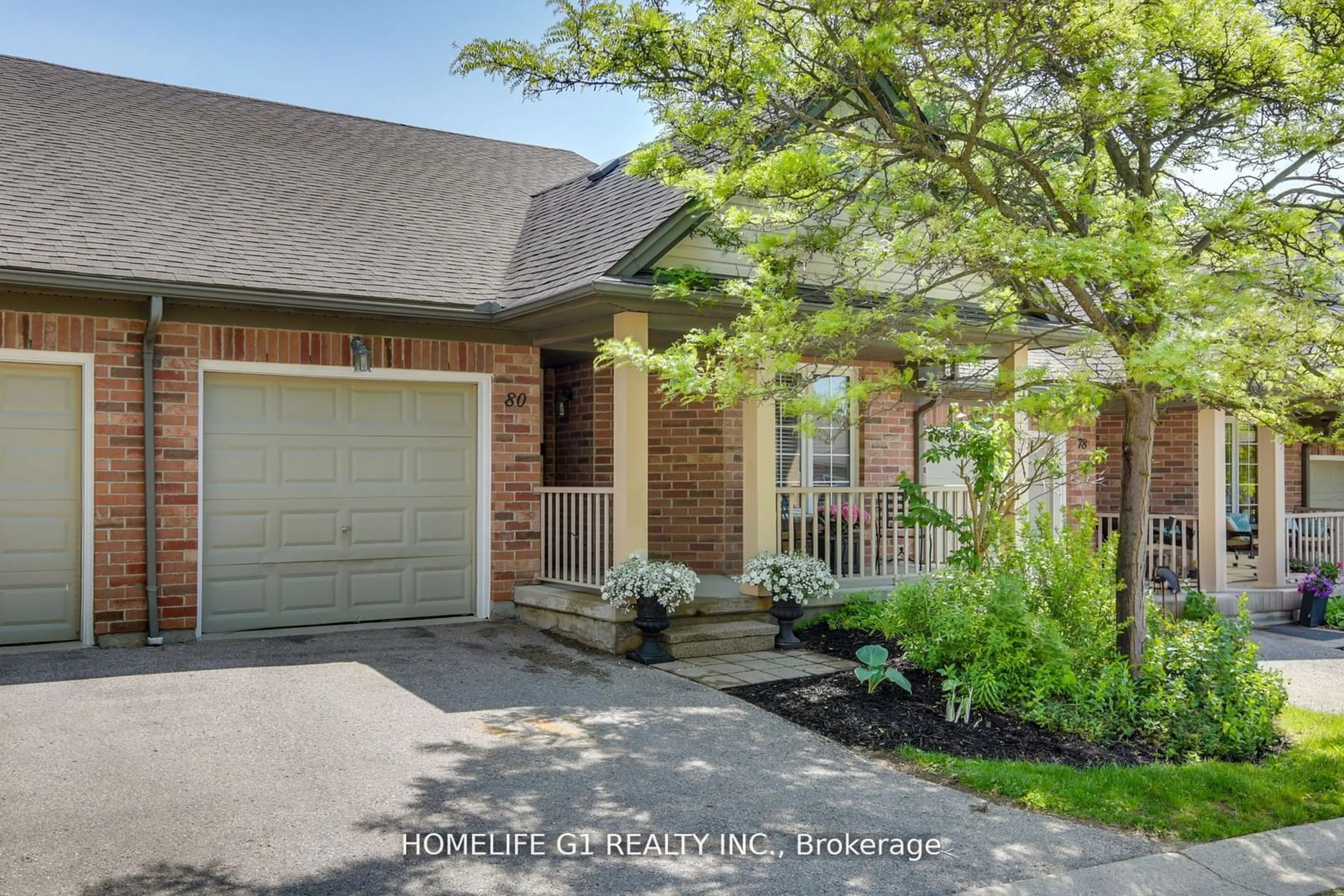 Home with brick exterior material, street for 320 Ambleside Dr #80, London Ontario N6G 5H8