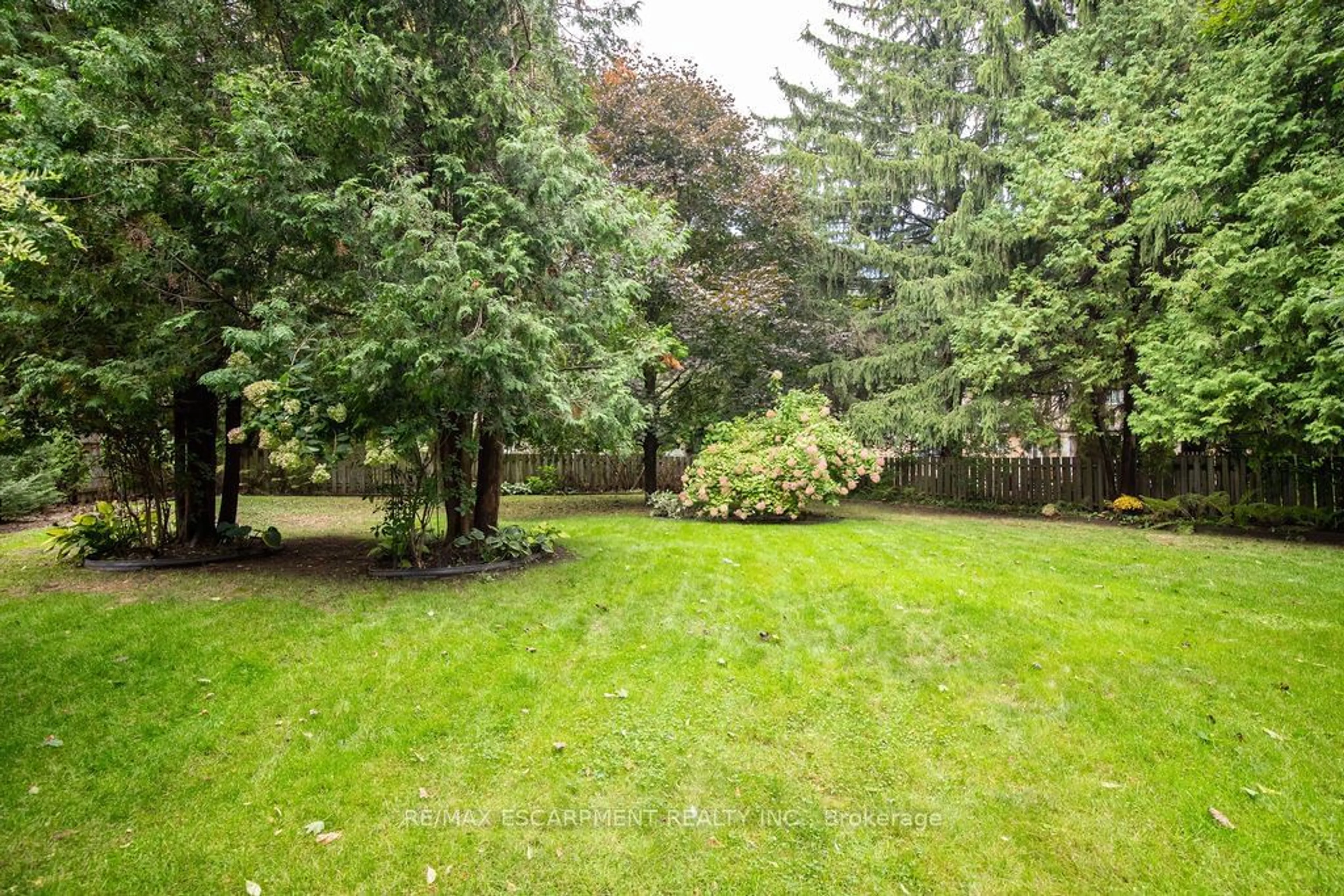 Patio, forest/trees view for 341 Clarendon Dr, Hamilton Ontario L9G 2Y9