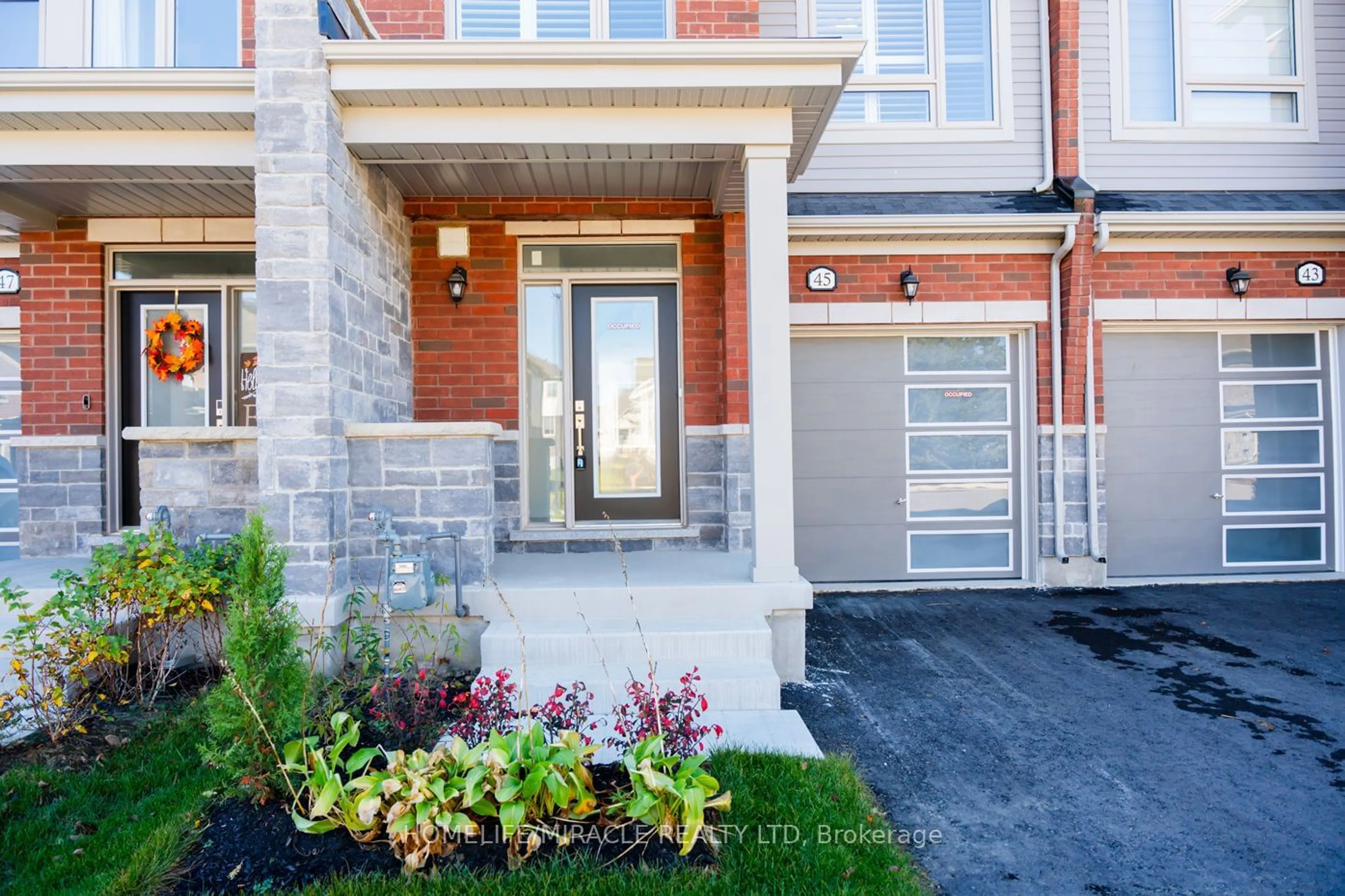 Home with brick exterior material, street for 45 Edminston Dr, Centre Wellington Ontario N1M 0J3