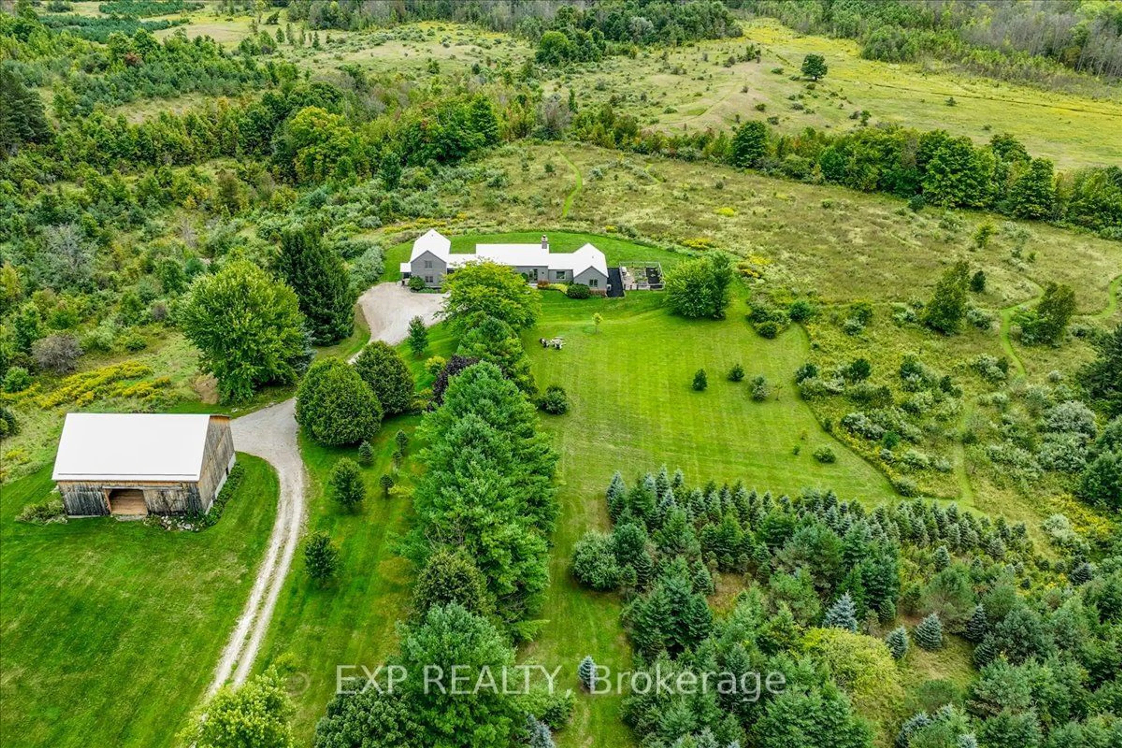 A pic from outside/outdoor area/front of a property/back of a property/a pic from drone, forest/trees view for 195851 Grey Road 7 Kimberly Rd, Grey Highlands Ontario N0C 1G0